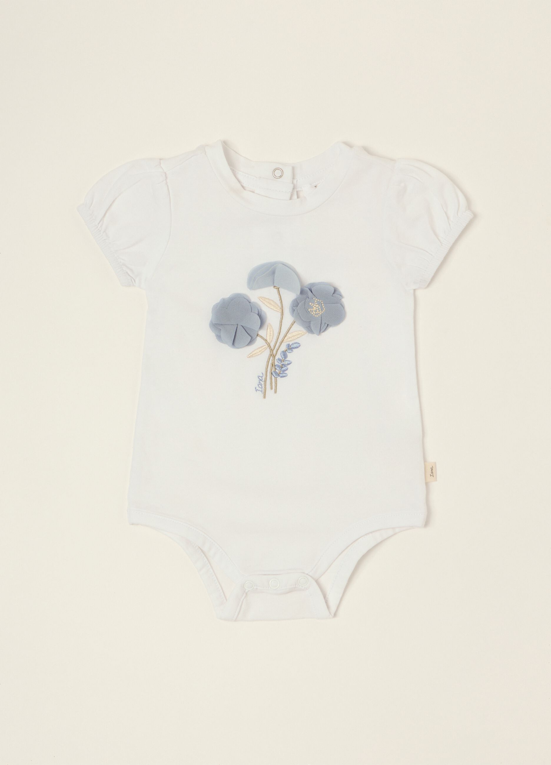 White baby girl bodysuit with floral details in stretch cotton