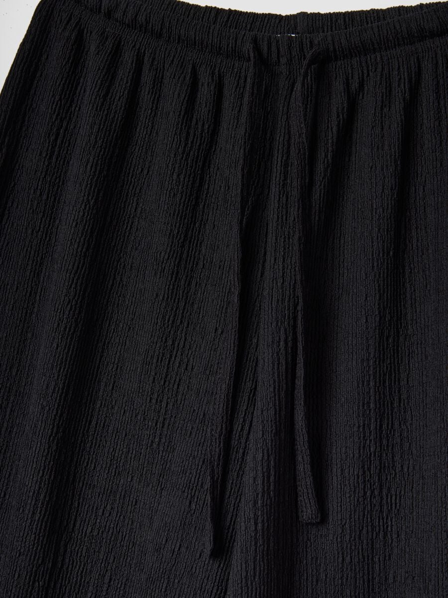 Black wide-leg jogger trousers_5