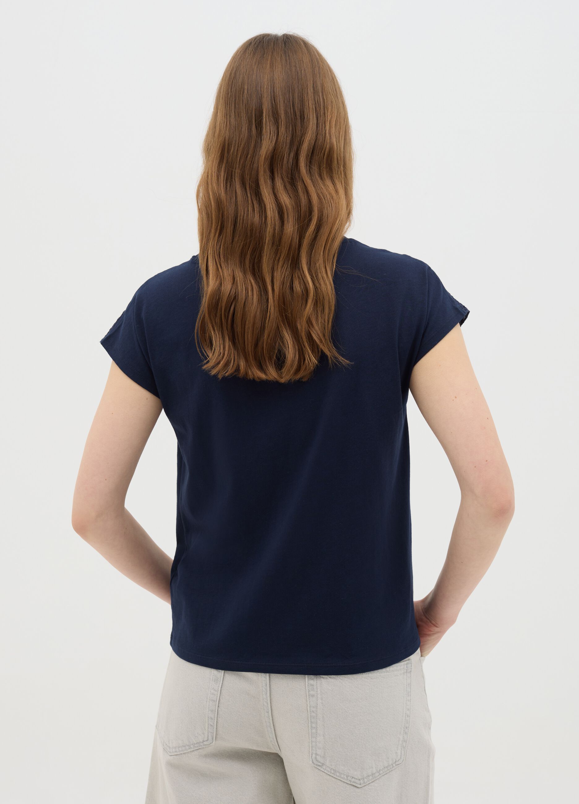 Blue short sleeve T-shirt with perforated details