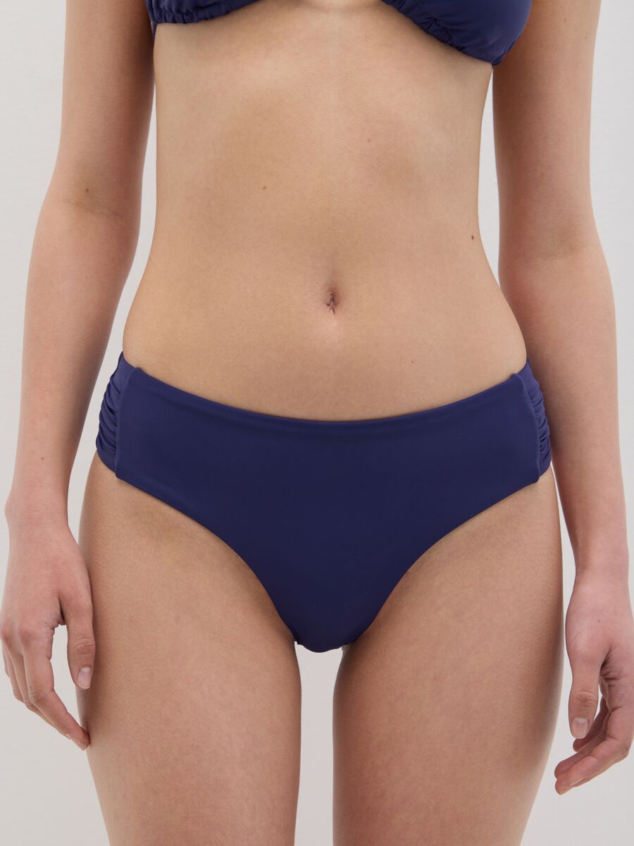 Women’s high rise bikini briefs in blue stretch fabric._1