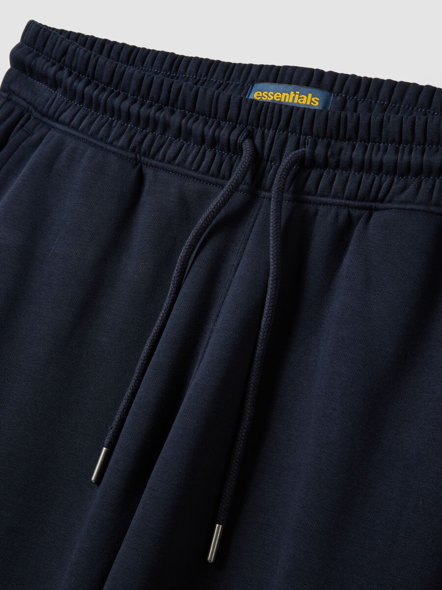 Blue cotton-blend joggers with cuffed hems and drawstring_1