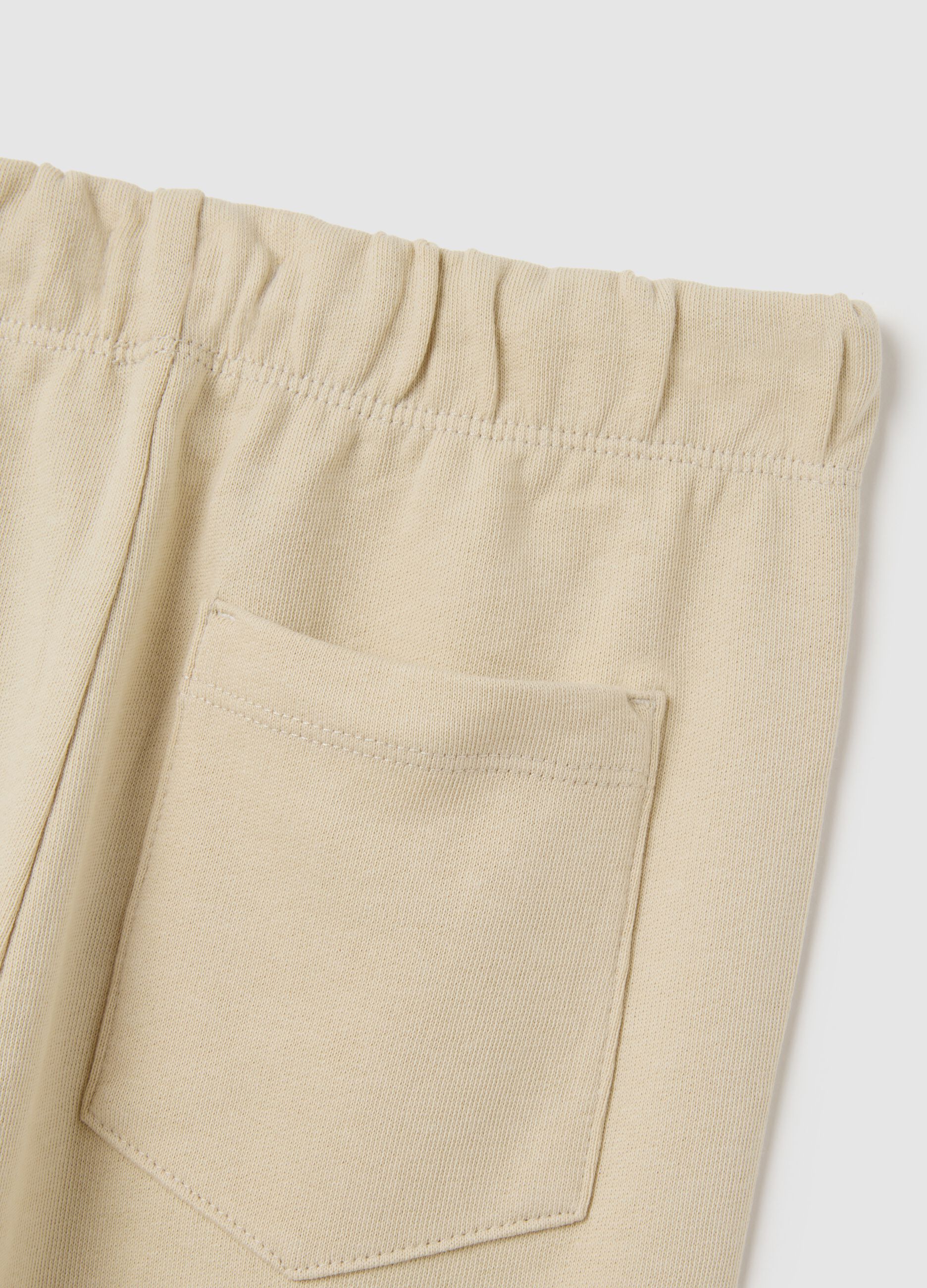 Children's beige regular fit jogger trousers in pure cotton