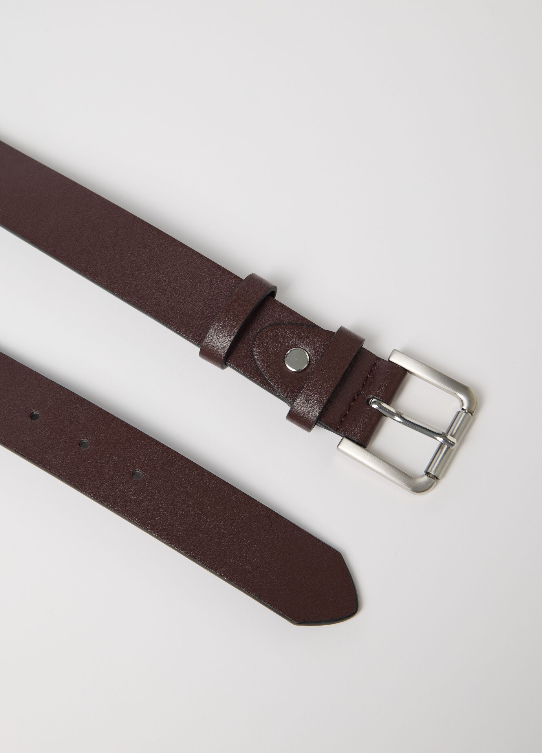 Brown belt with rounded metal buckle