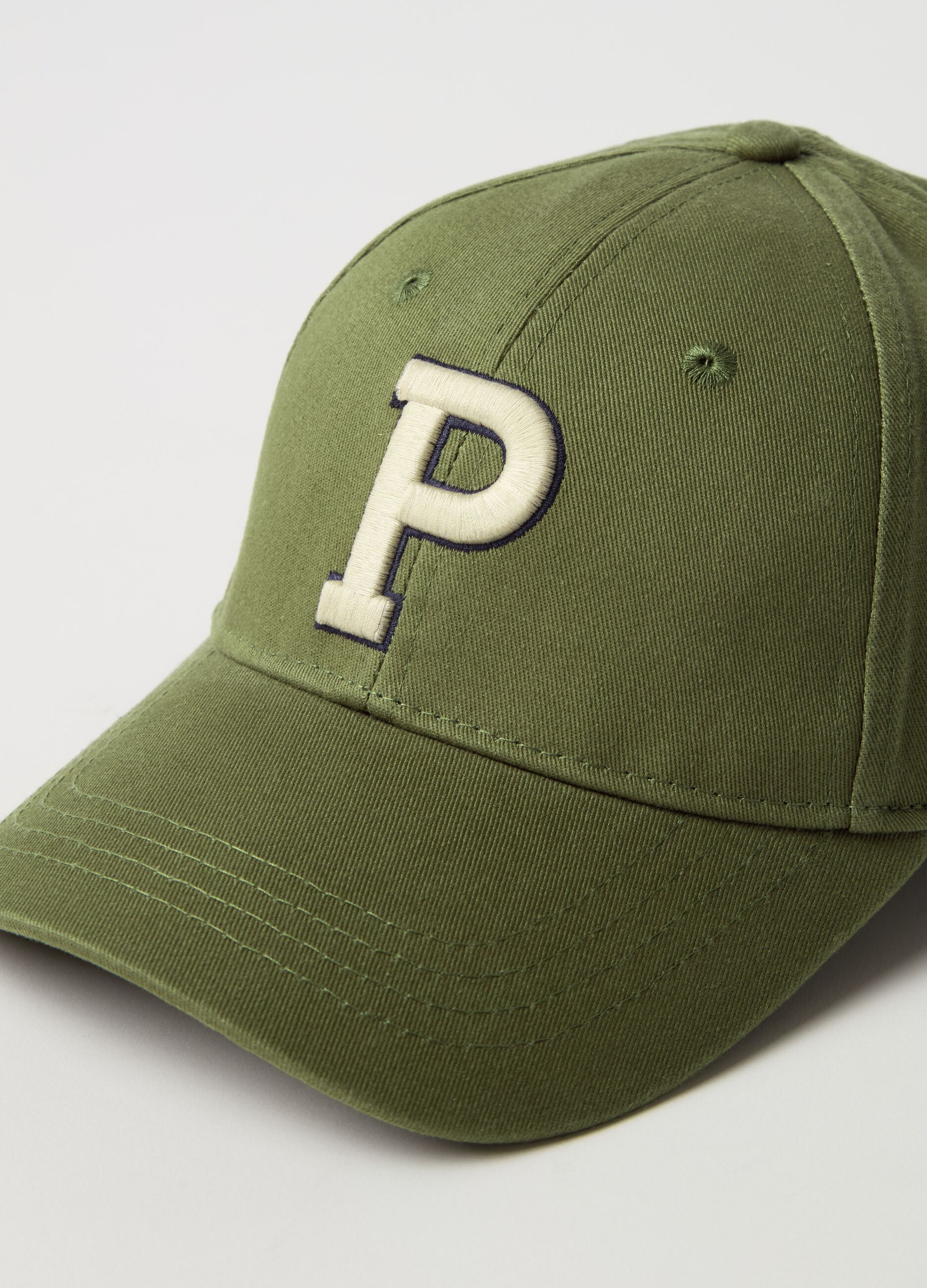 Baseball cap with embroidered logo