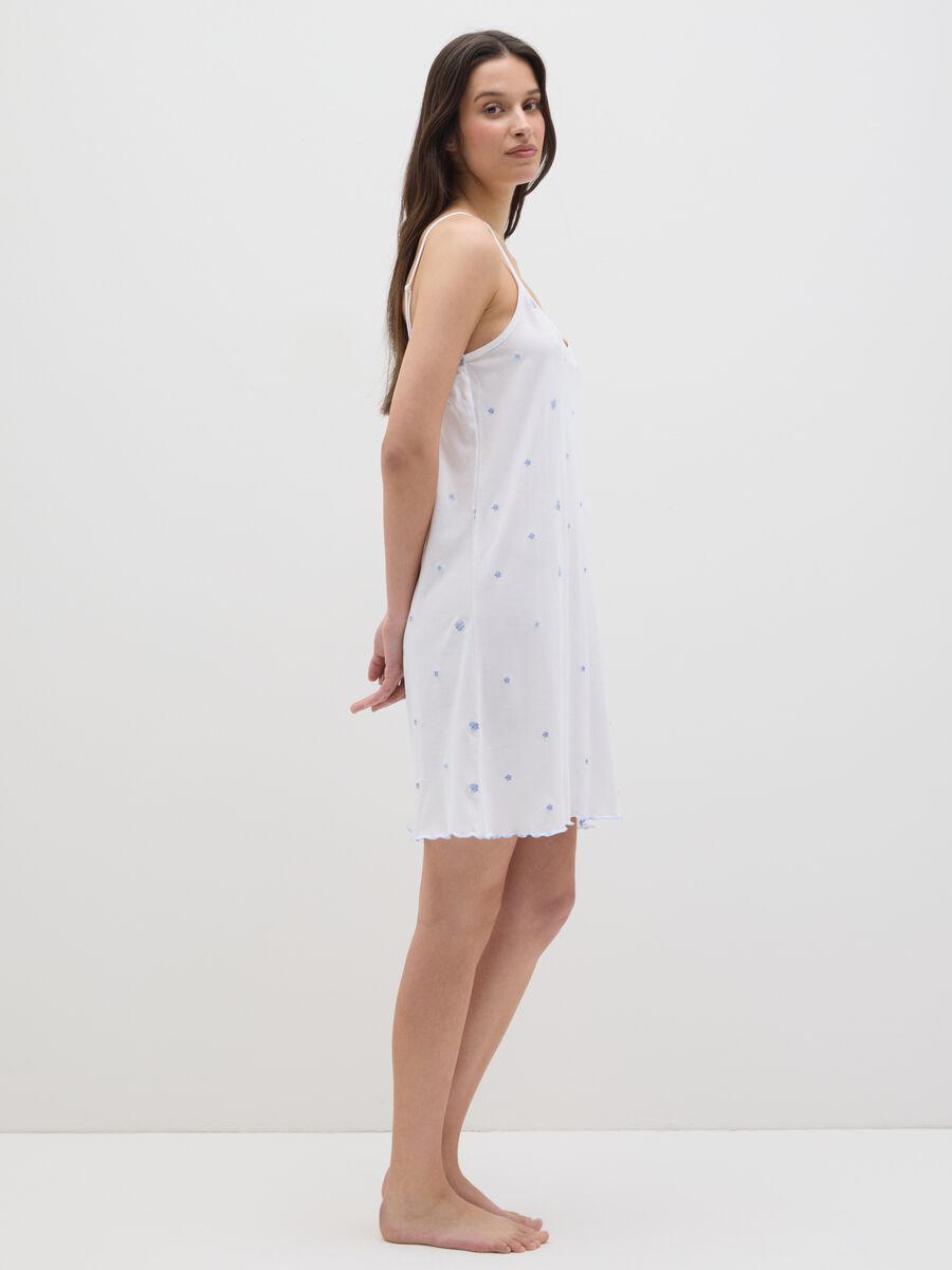 Women's dress in pure white cotton with flowers_0