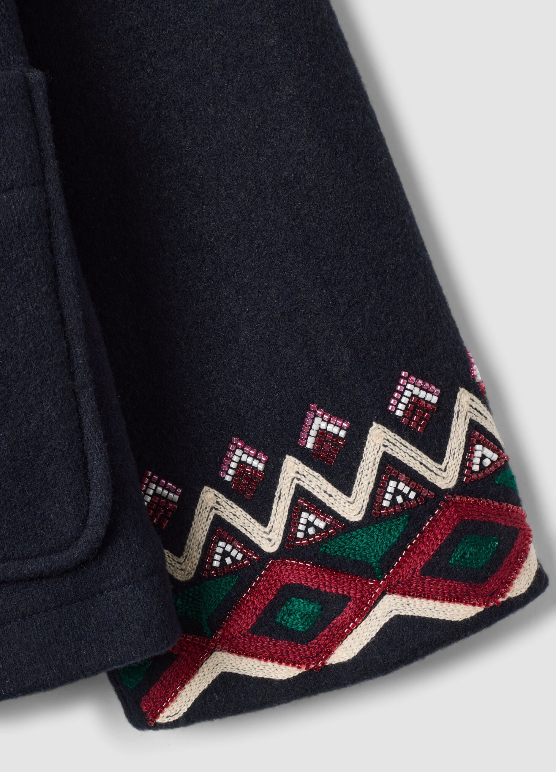 Cappotto blu in misto lana con ricami geometrici