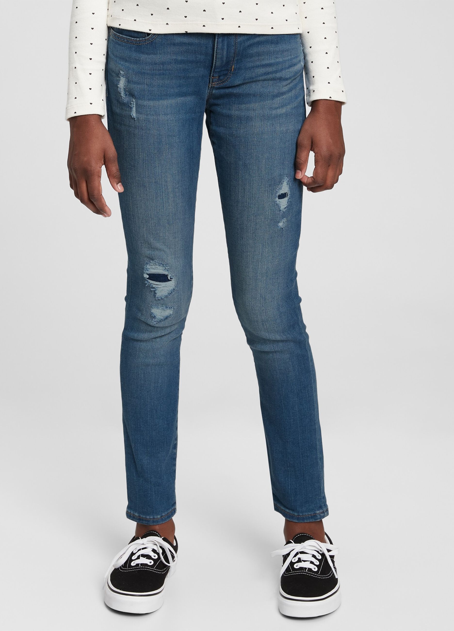Jeans skinny fit con abrasioni_0