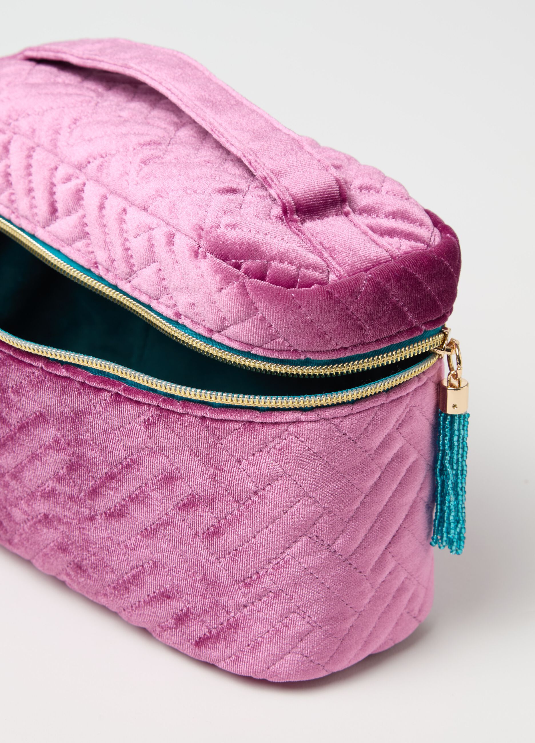 Beauty case in velluto trapuntato con manico