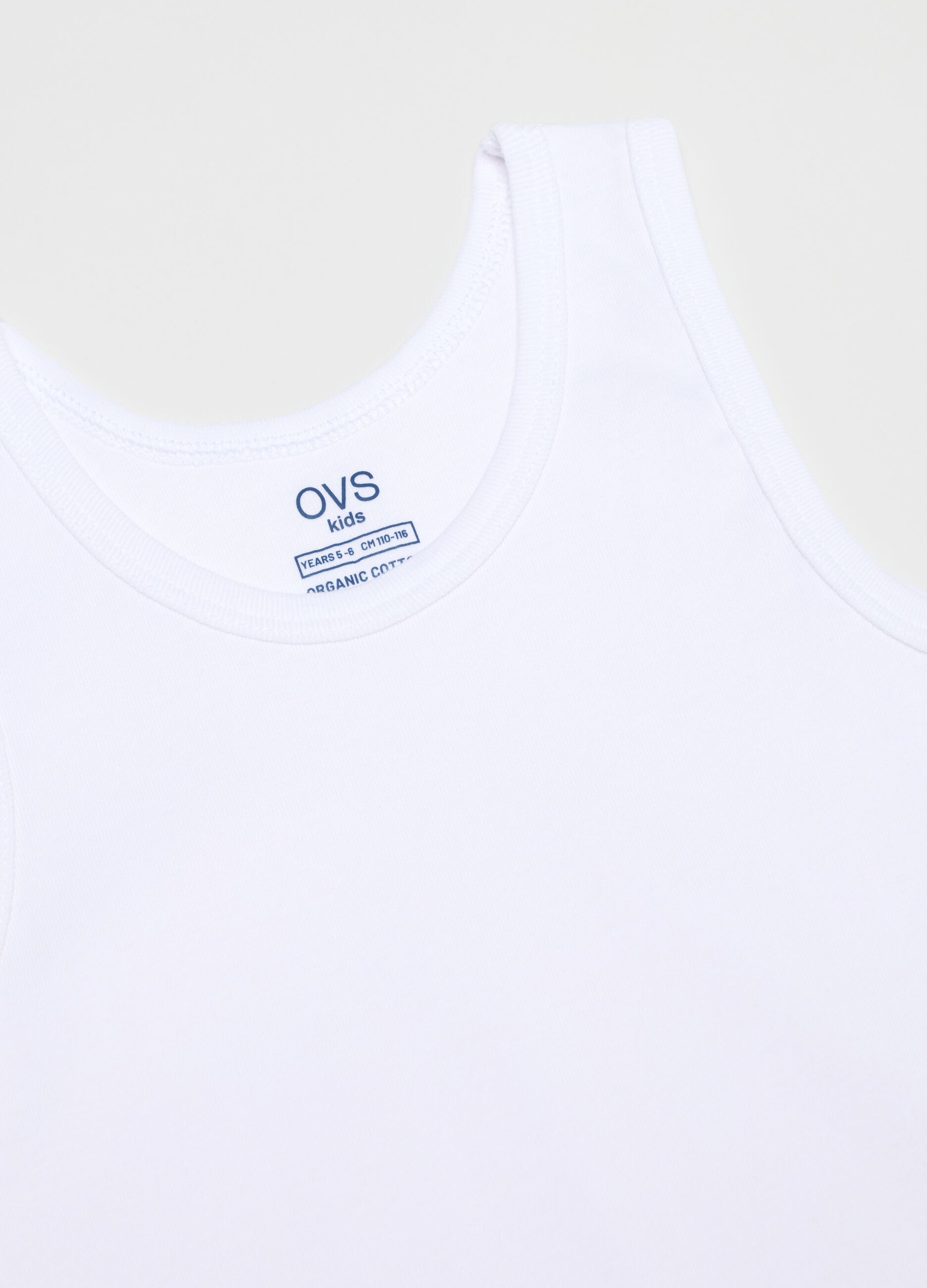 Pack of two boys' white cotton vests with a regular fit