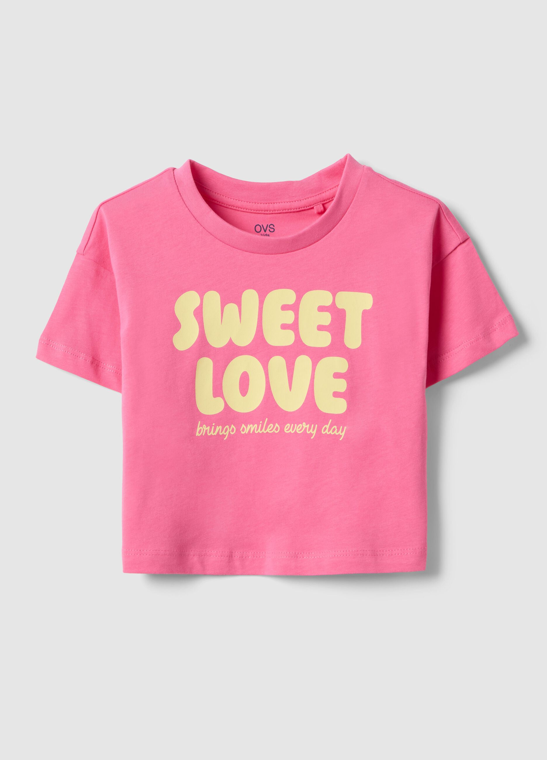T-shirt in puro cotone rosa da bambina boxy fit con scritta
