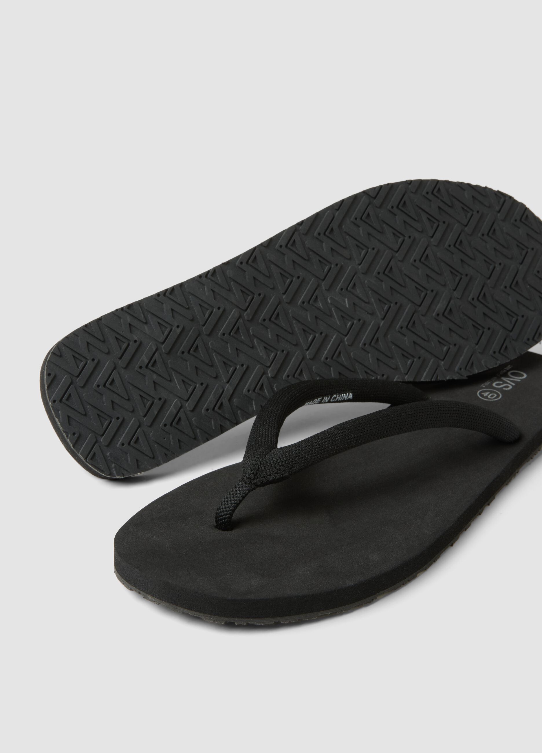 Black flip-flops with chunky straps