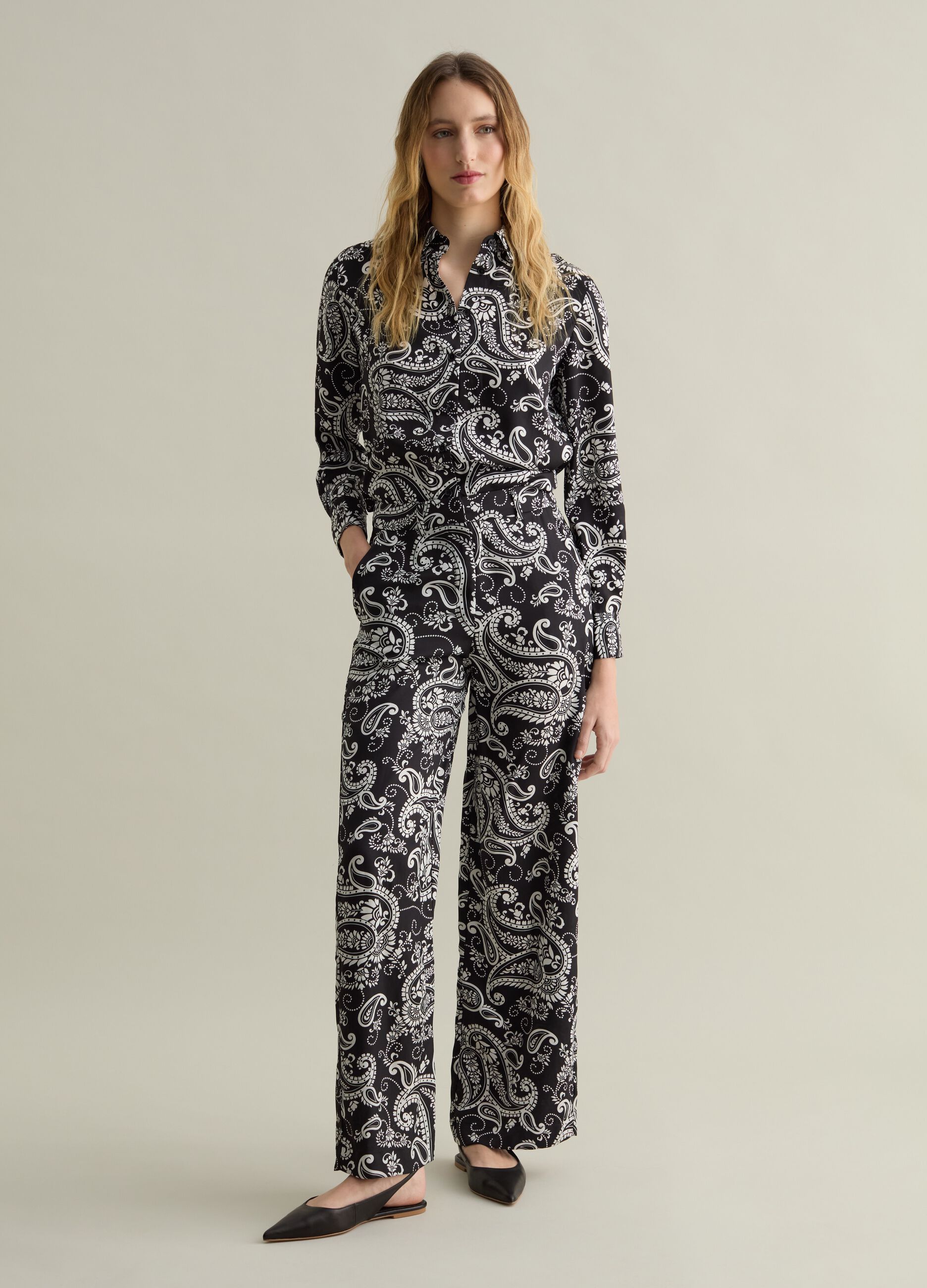 Pantalone a gamba larga stampa all-over