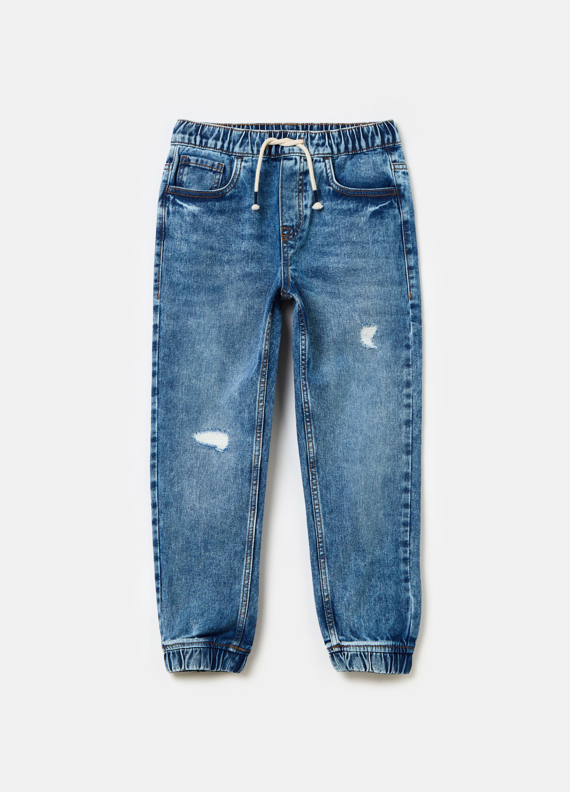 Joggers in denim acid wash con abrasioni