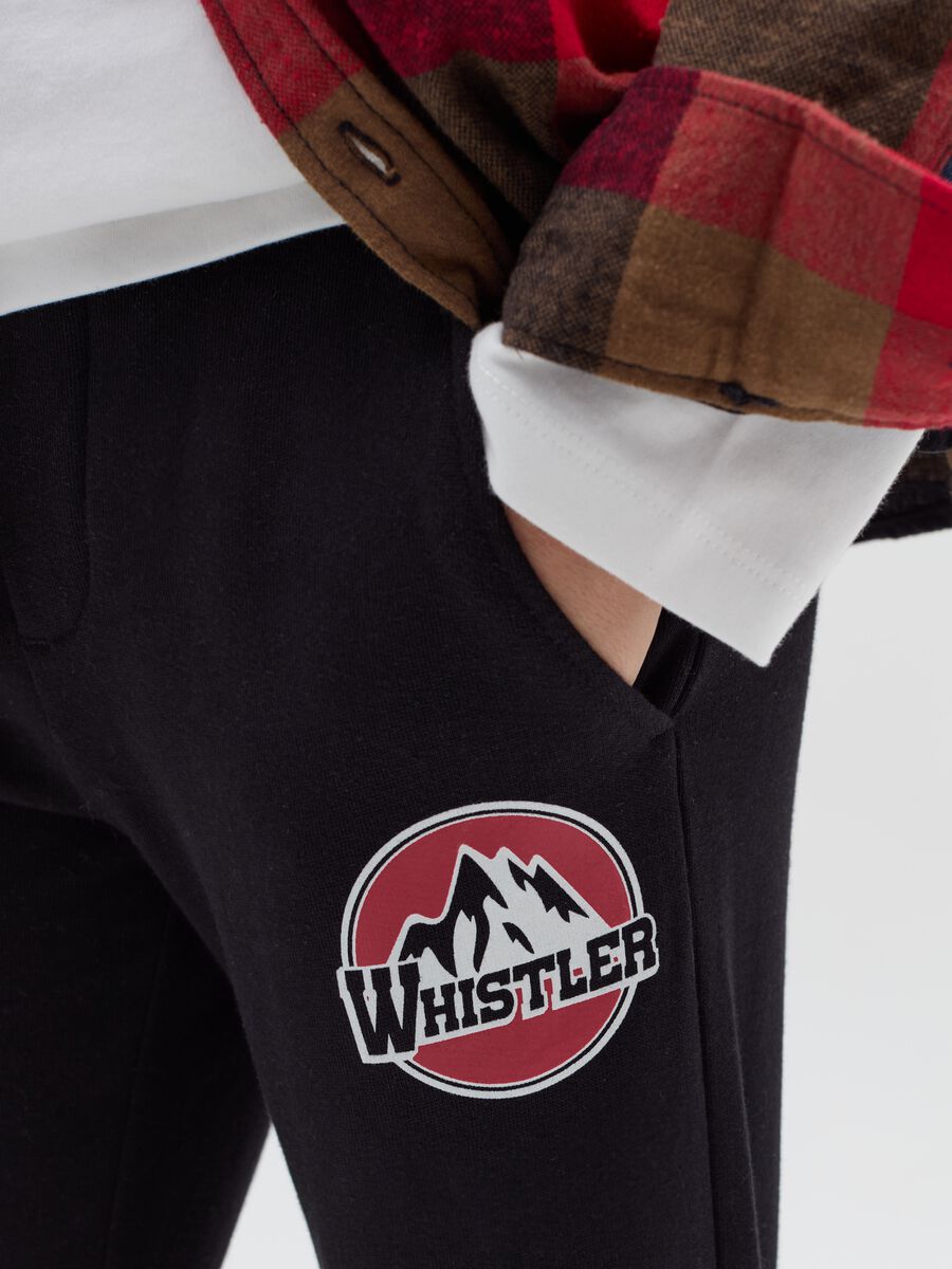 Joggers with drawstring and "Whistler" print_1
