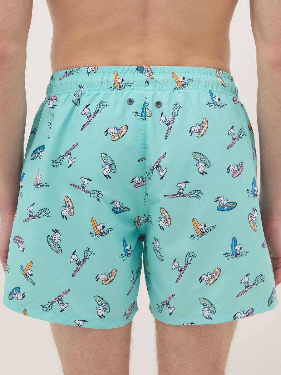 Costume azzurro con stampe Snoopy surf_2