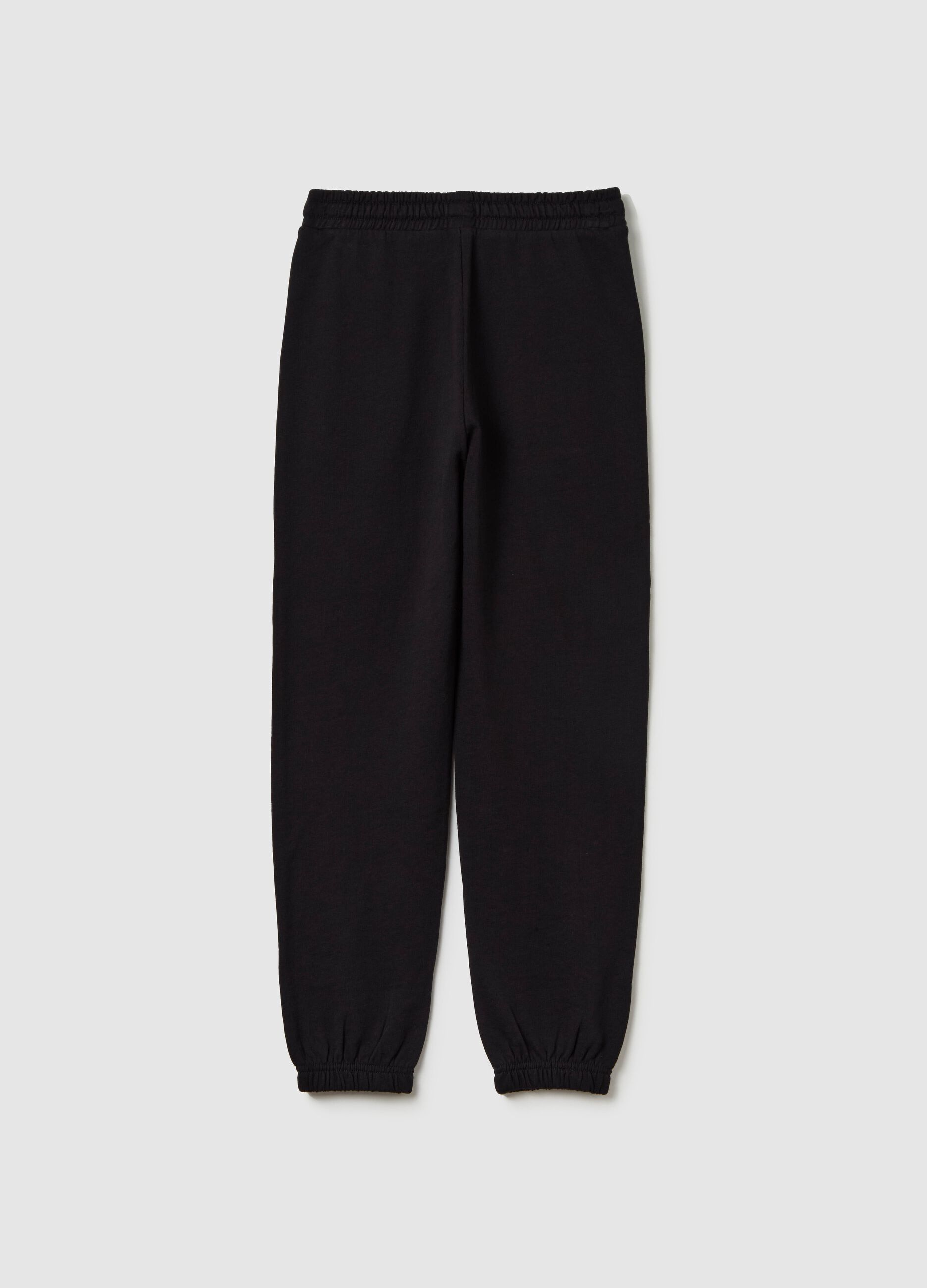 Joggers with drawstring and "Hope” flame print