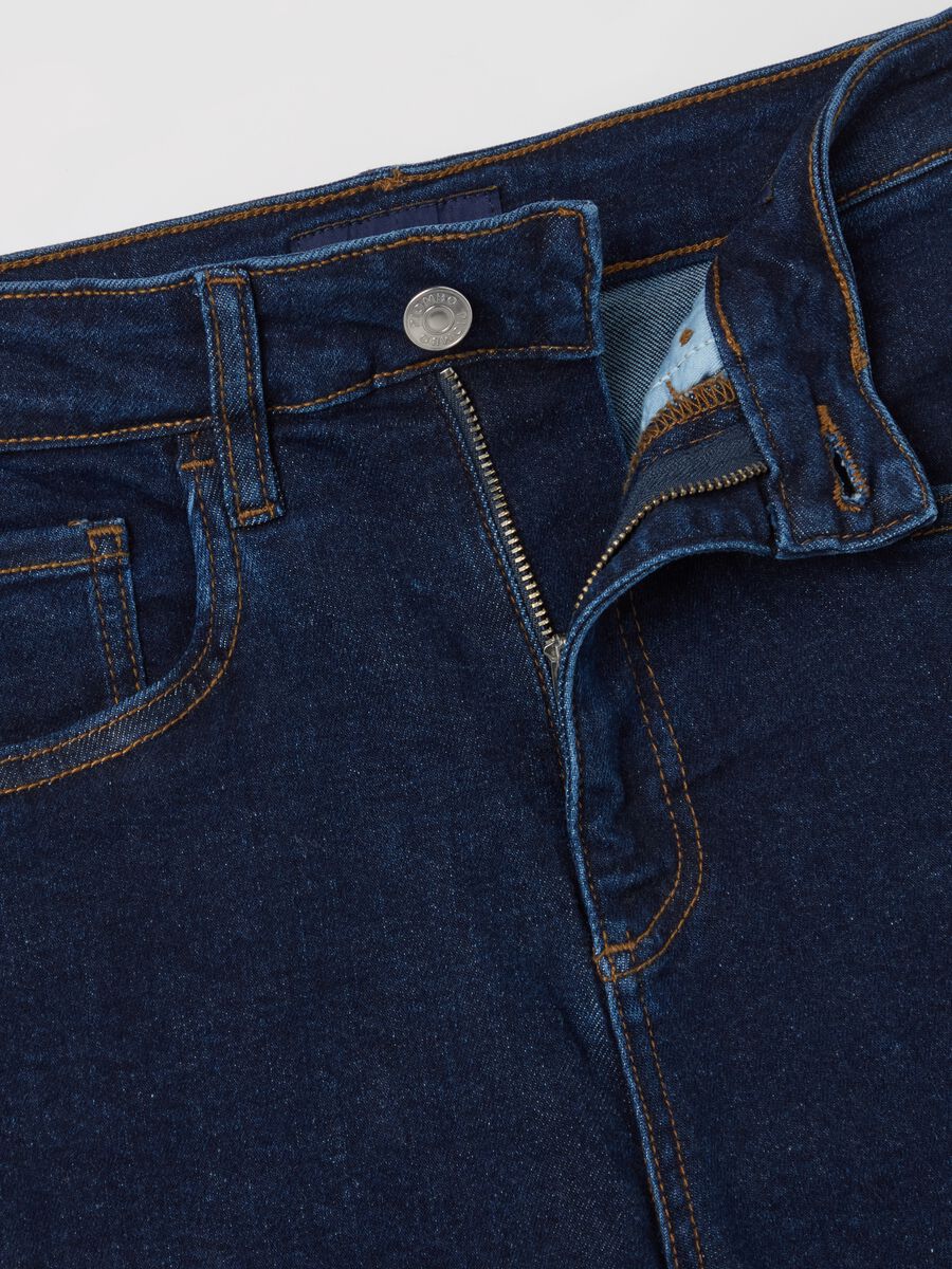 Cropped blue flare-fit jeans with raw edging_5