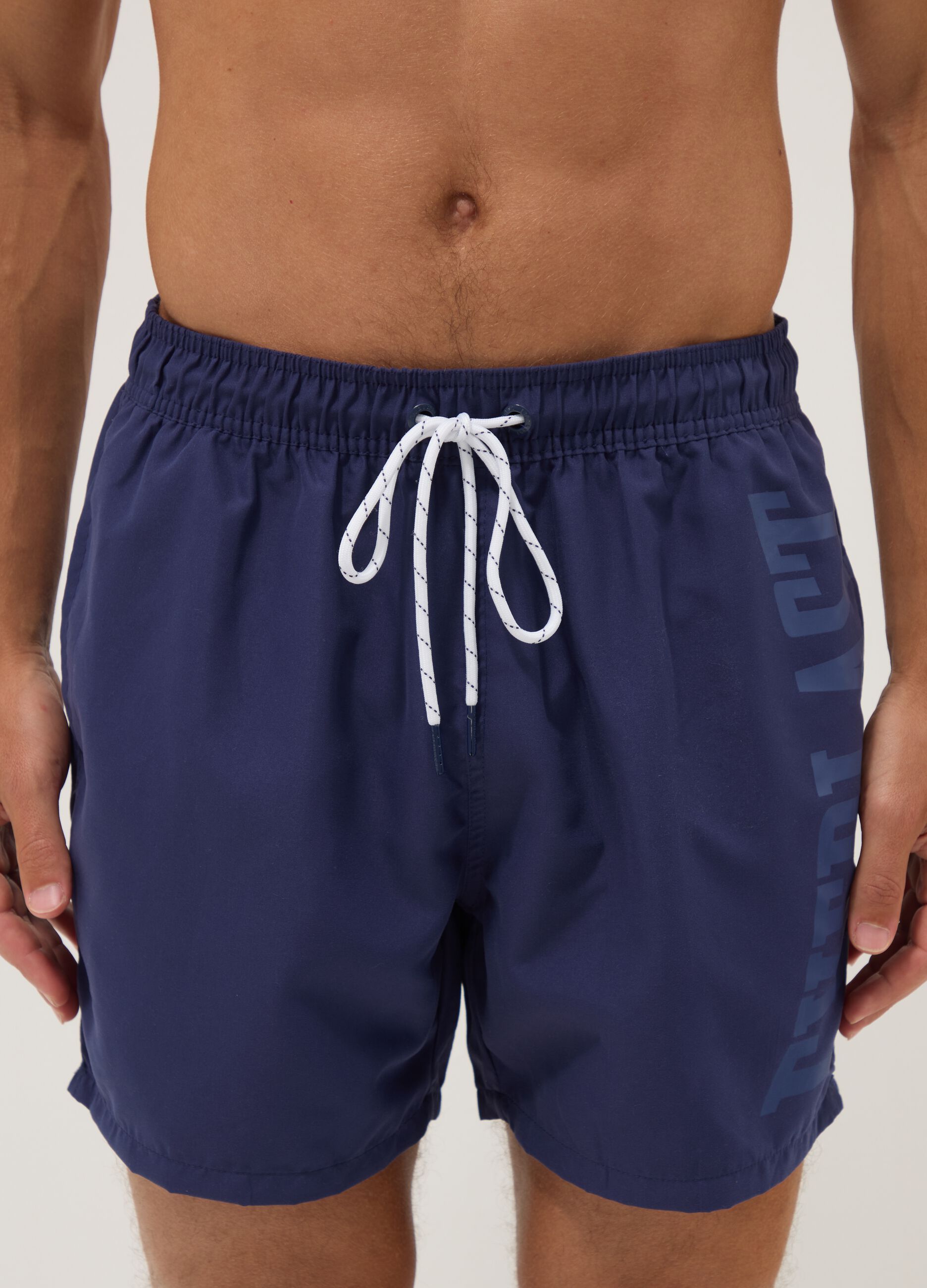 Blue swim shorts with contrast drawstring