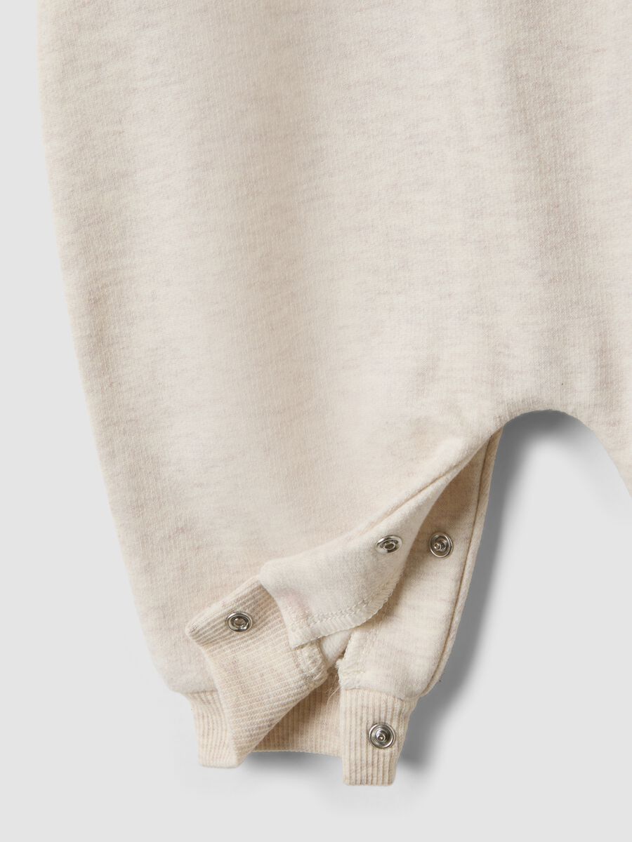 Tutina beige in puro cotone organico con stampa dinosauro per neonato_2