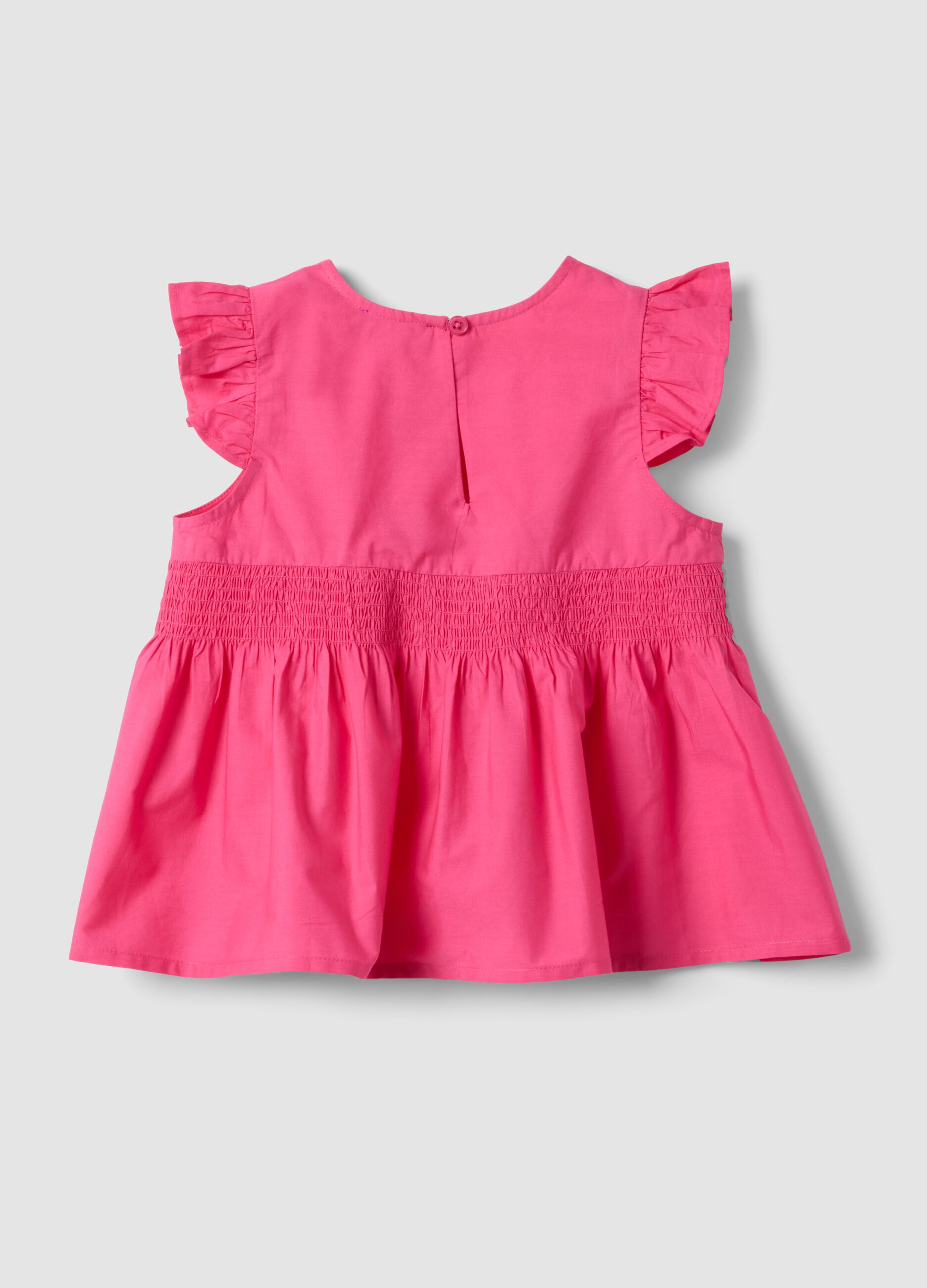 Top rosa in puro cotone con volant