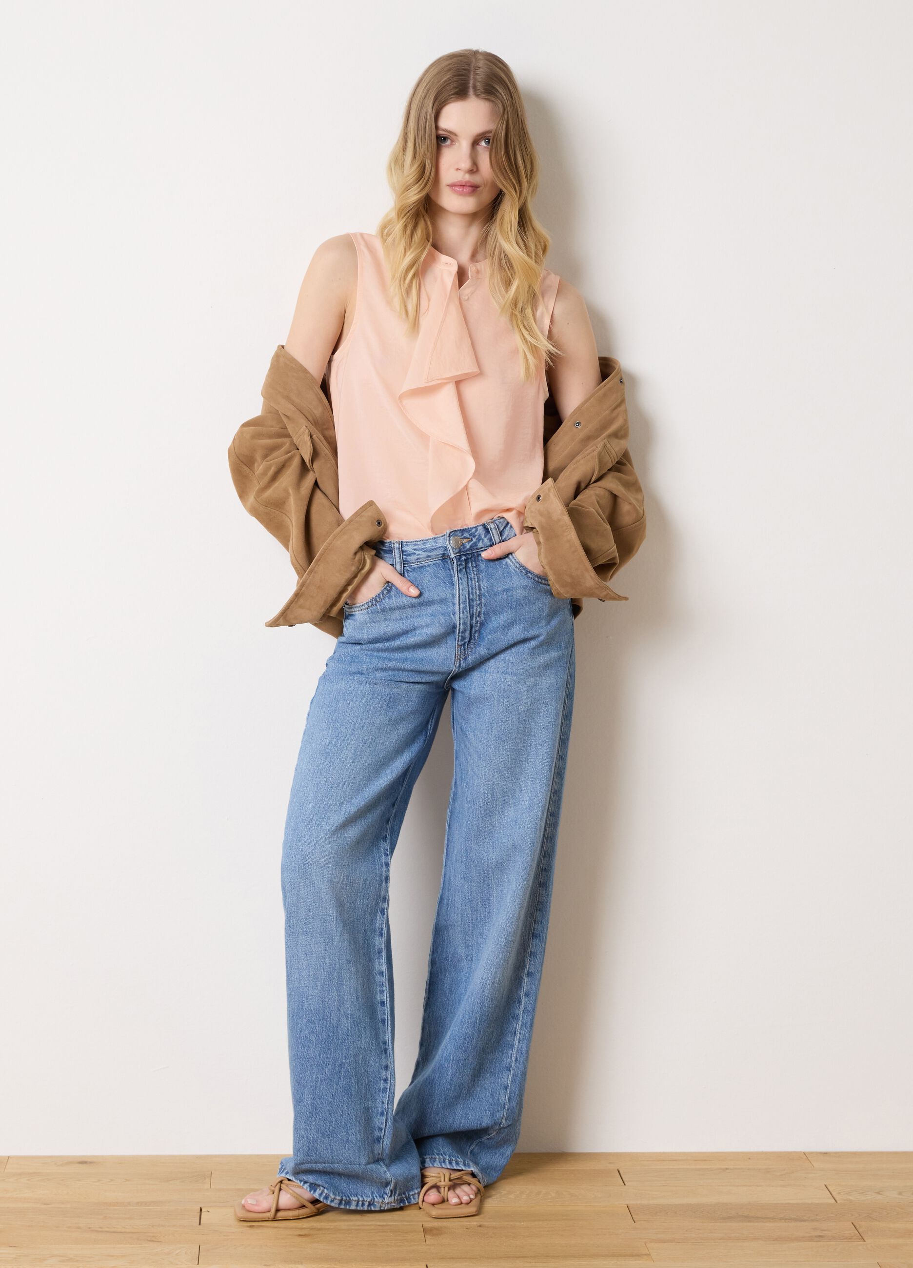 Pink sleeveless blouse with flounce