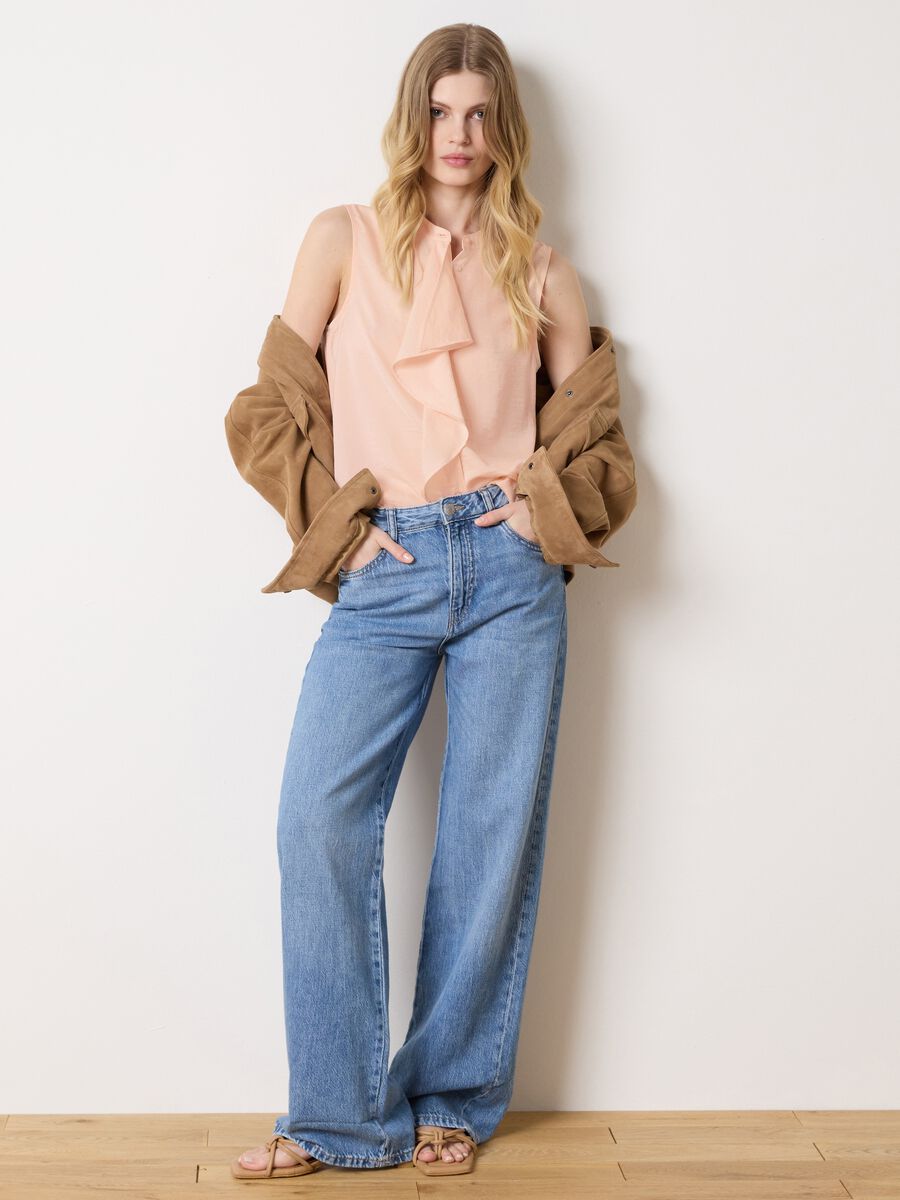 Pink sleeveless blouse with flounce_0