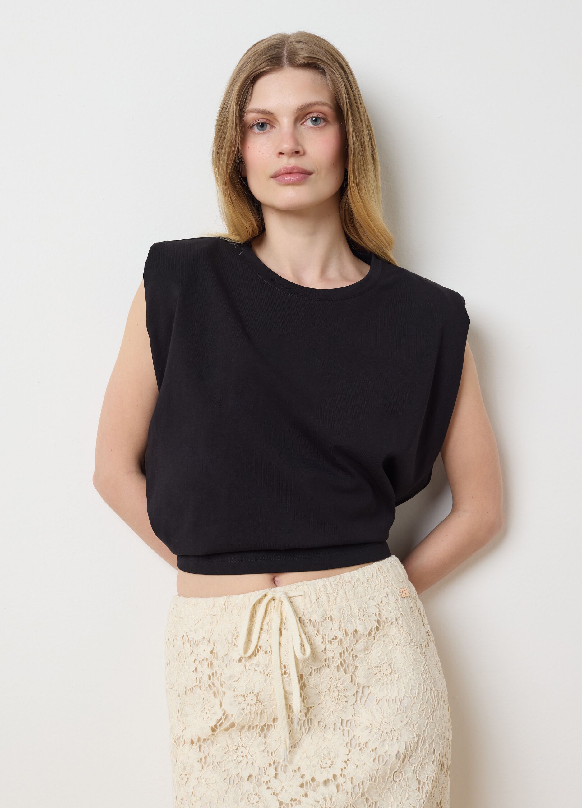 Black sleeveless boxy-fit T-shirt with spaghetti straps
