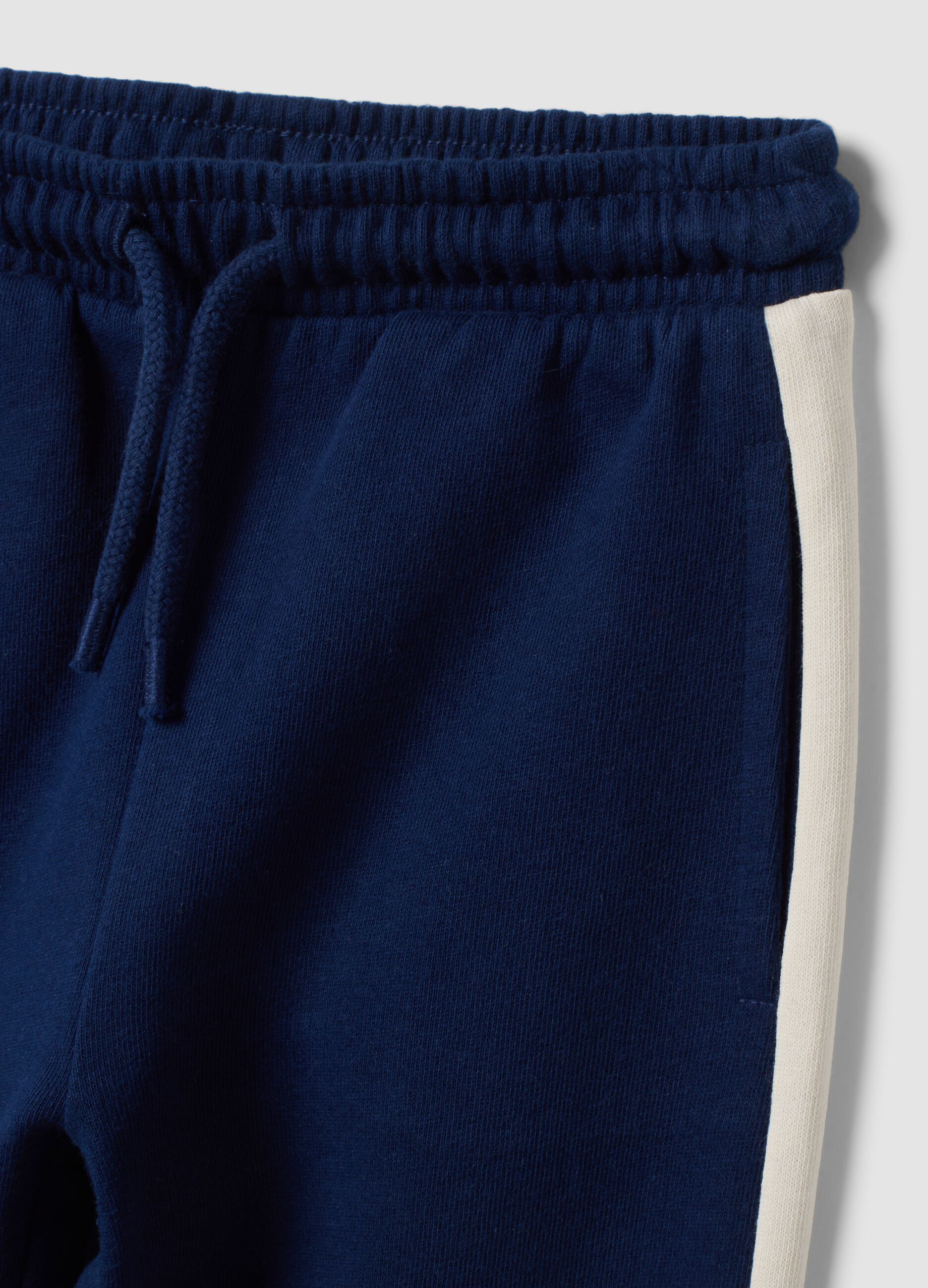 Blue organic cotton joggers with contrast side stripes