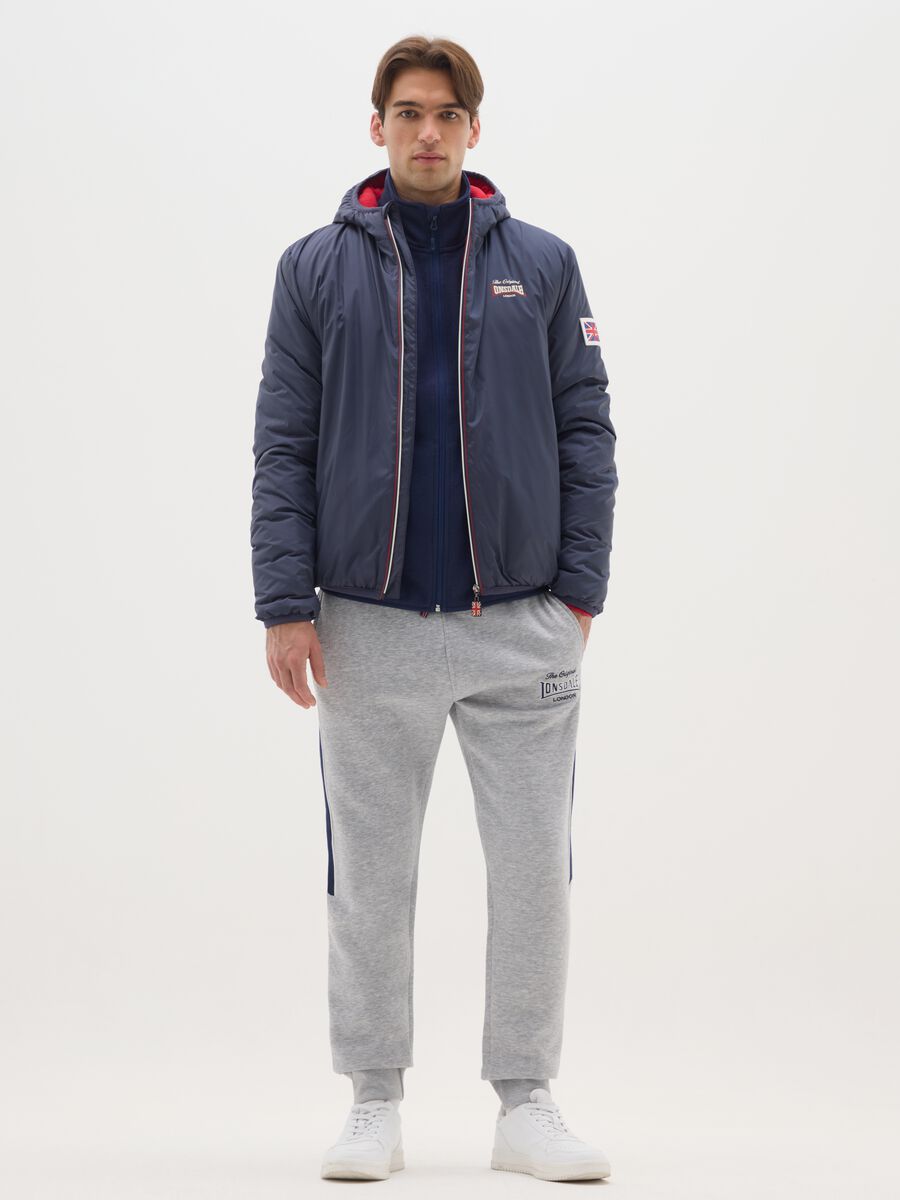 Blue padded jacket with hood and zip_1