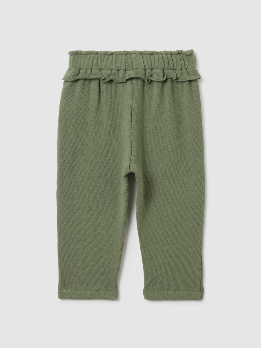 Green cotton stretch baggy trousers for girls_1