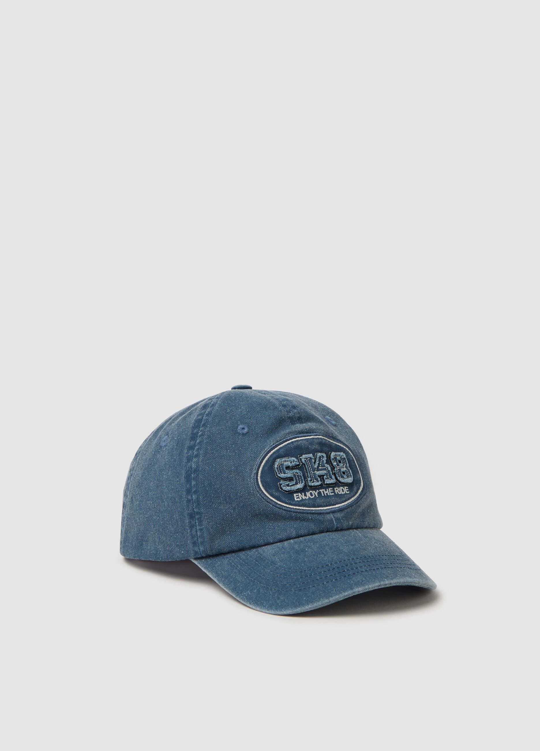 Medium denim baseball cap with "SK8" patch