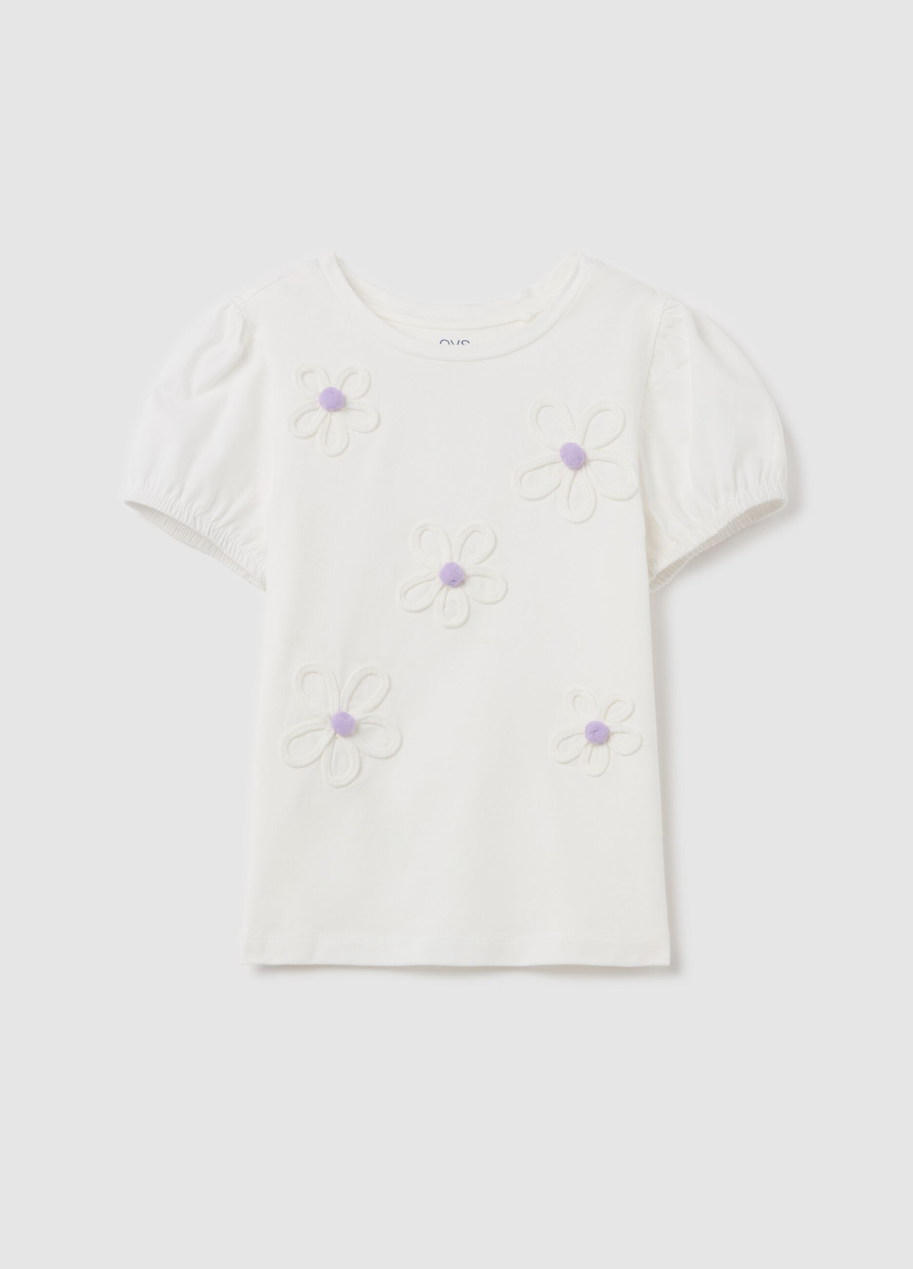 T-shirt with flowers application and pompoms