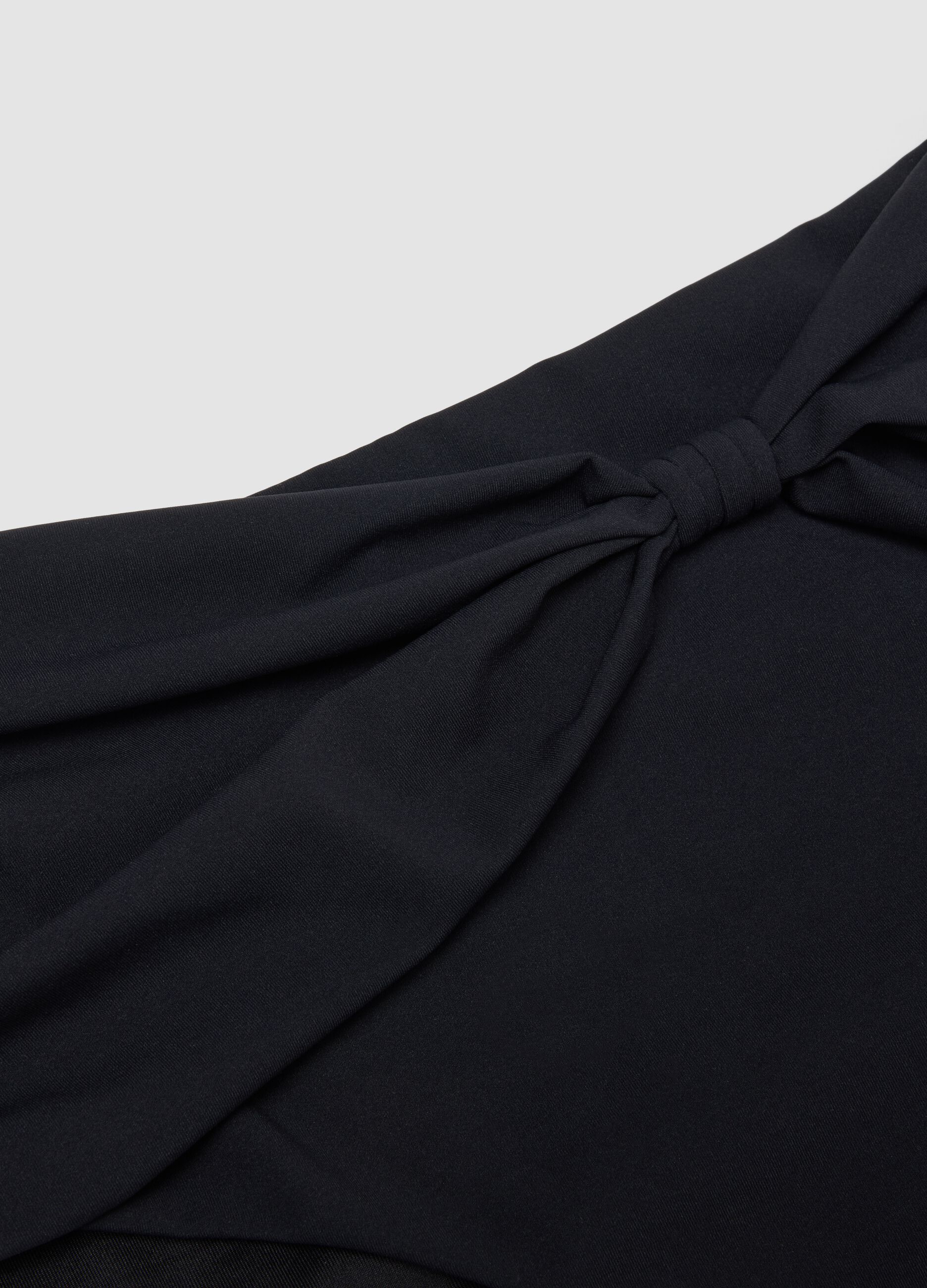 Black bikini bottoms with knotted detail in stretchy shaping fabric