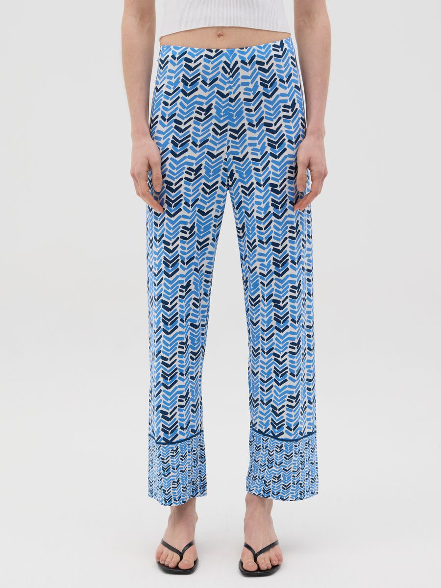 Blue jersey trousers with geometric pattern_1