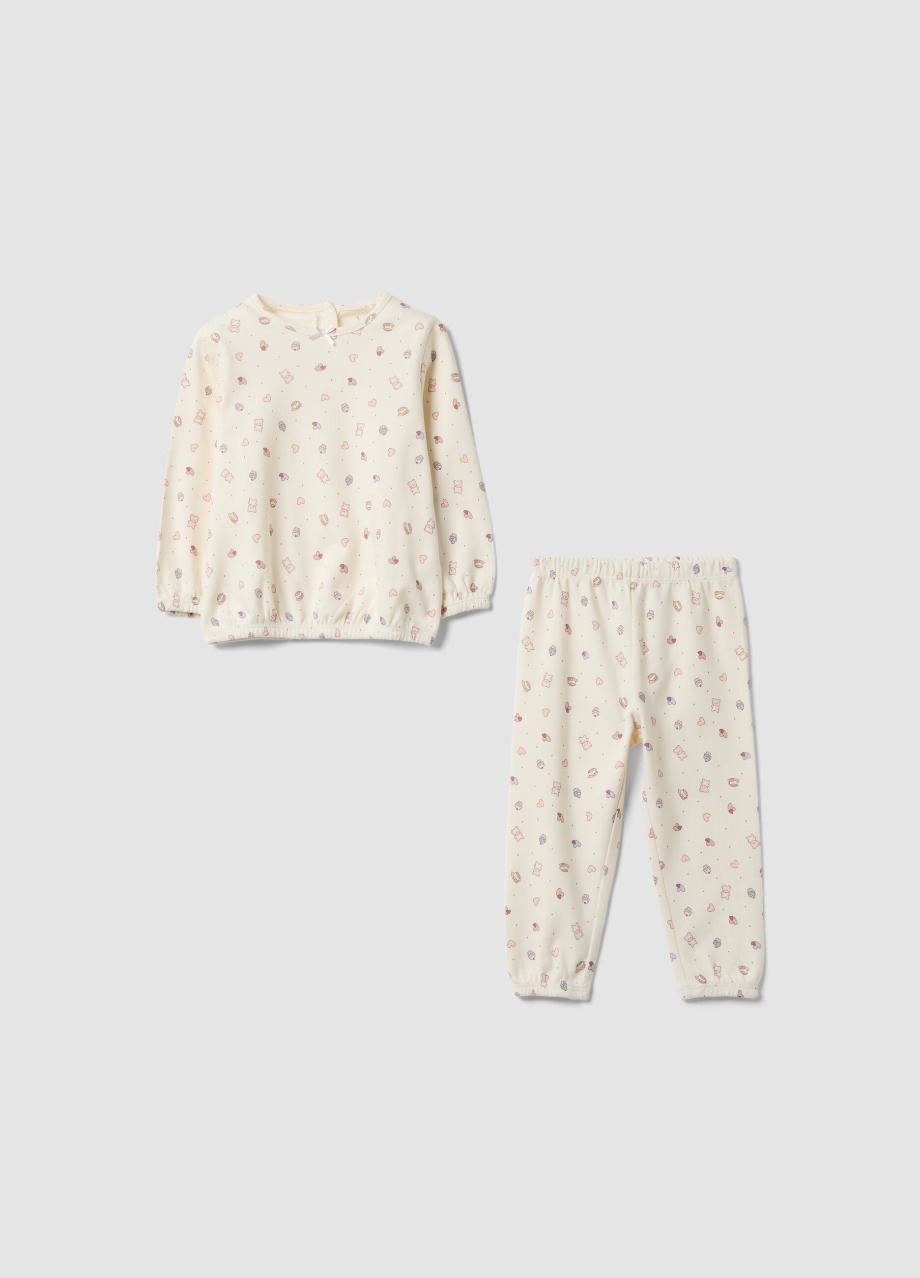 White organic cotton pyjamas with hearts and teddy bear print for baby girl