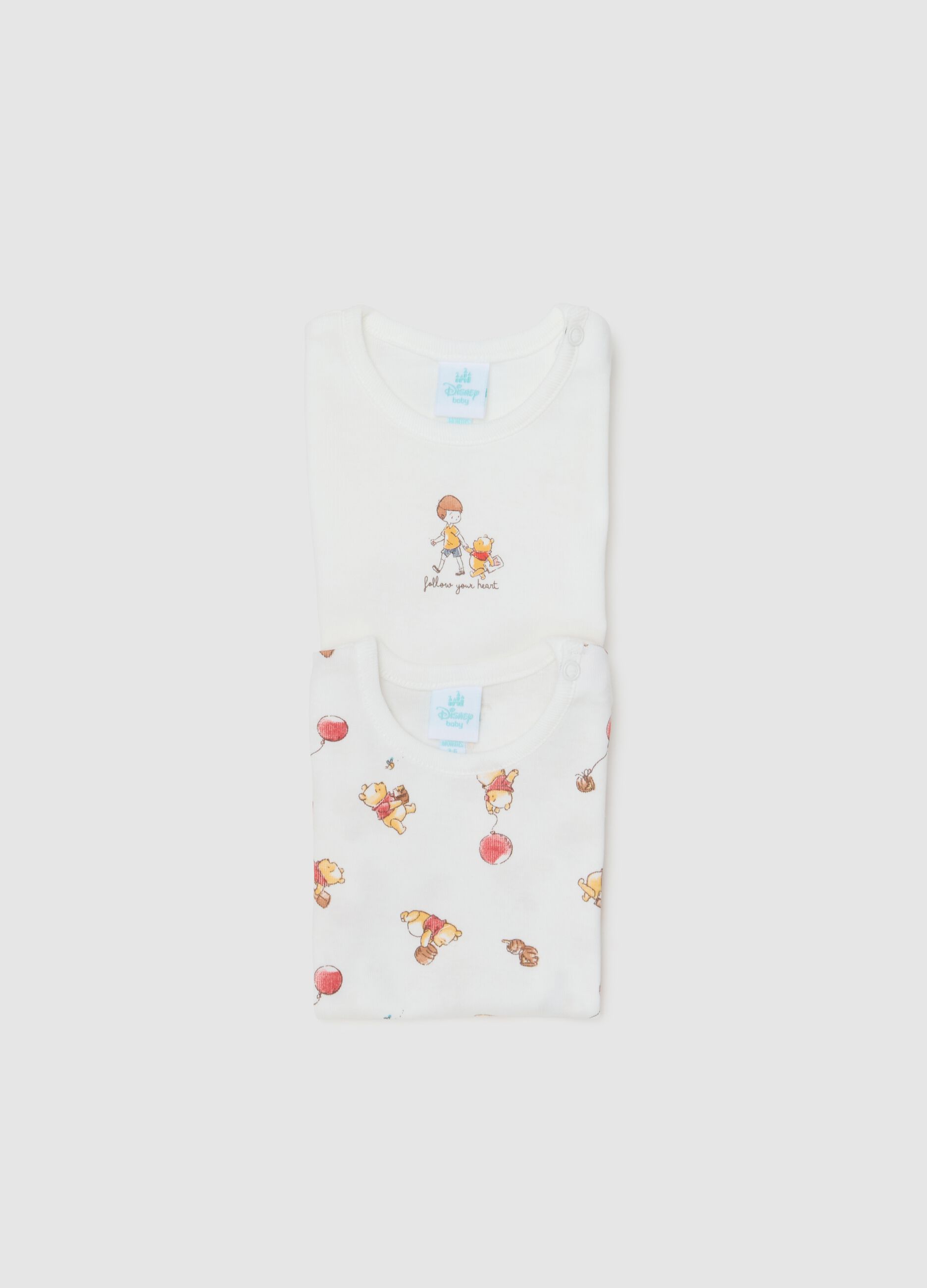 Set of two white newborn bodysuits in pure cotton