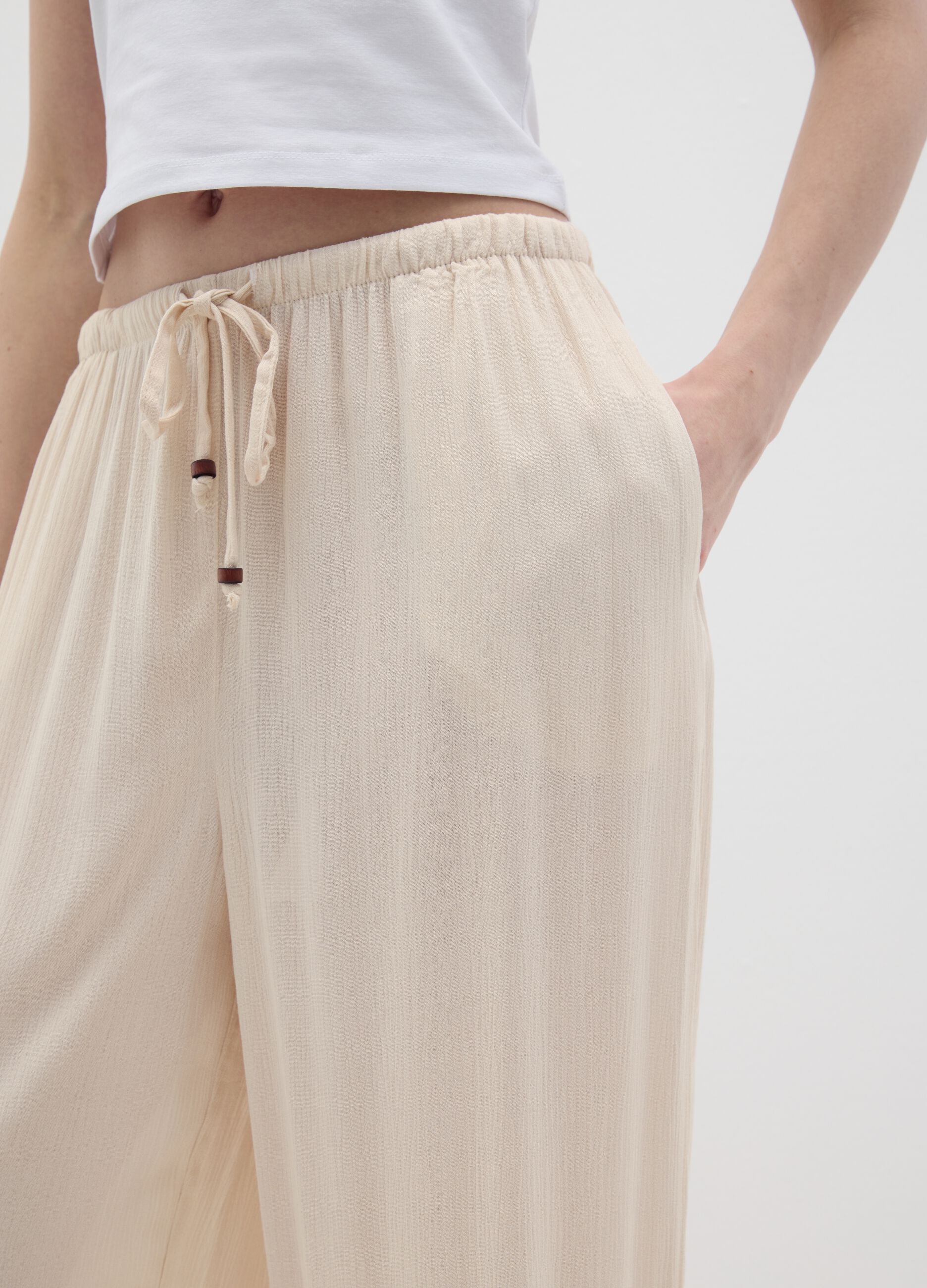 Women's beige relaxed-fit trousers in 100% viscose
