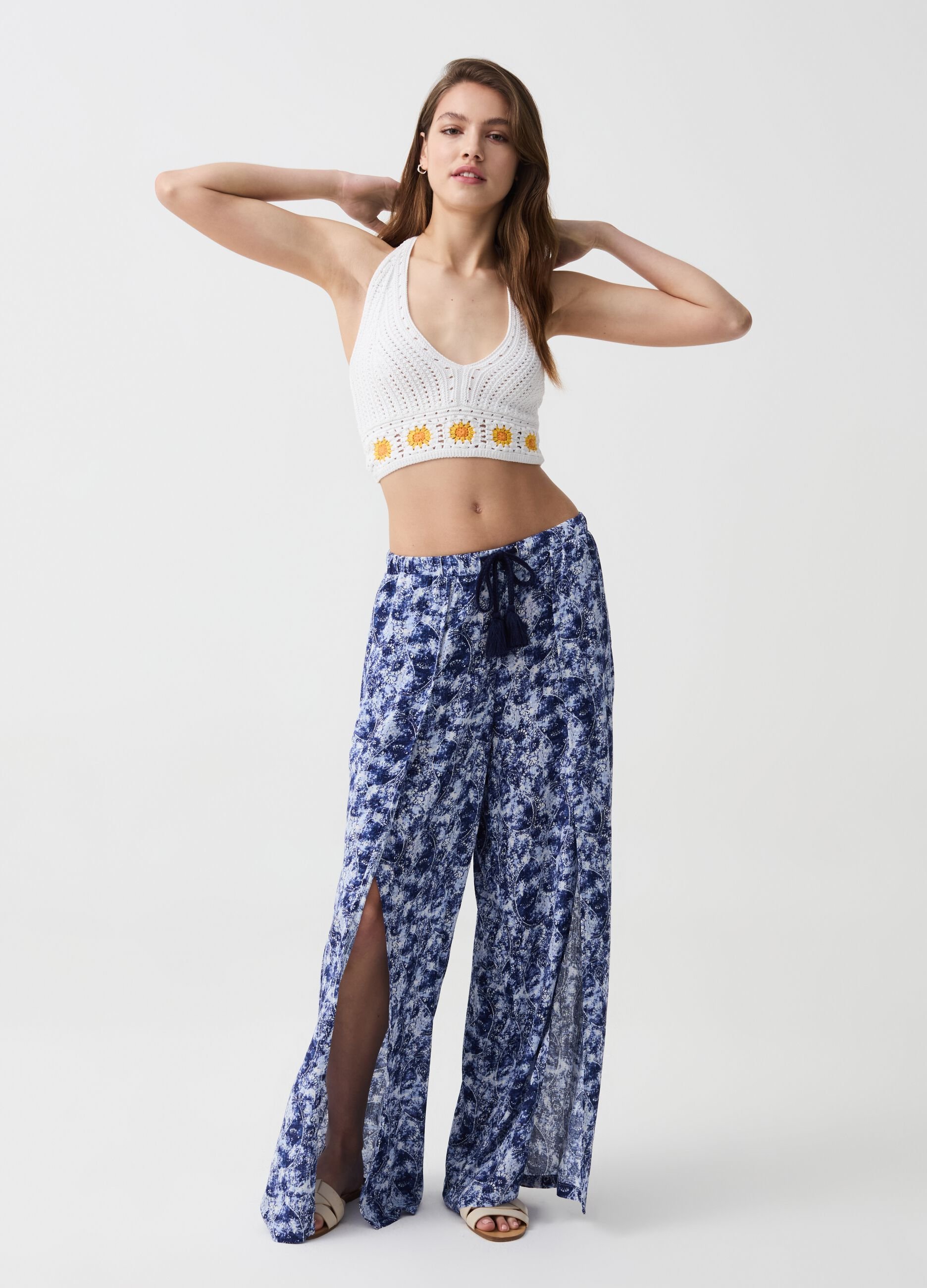 Crochet crop top with flowers embroidery