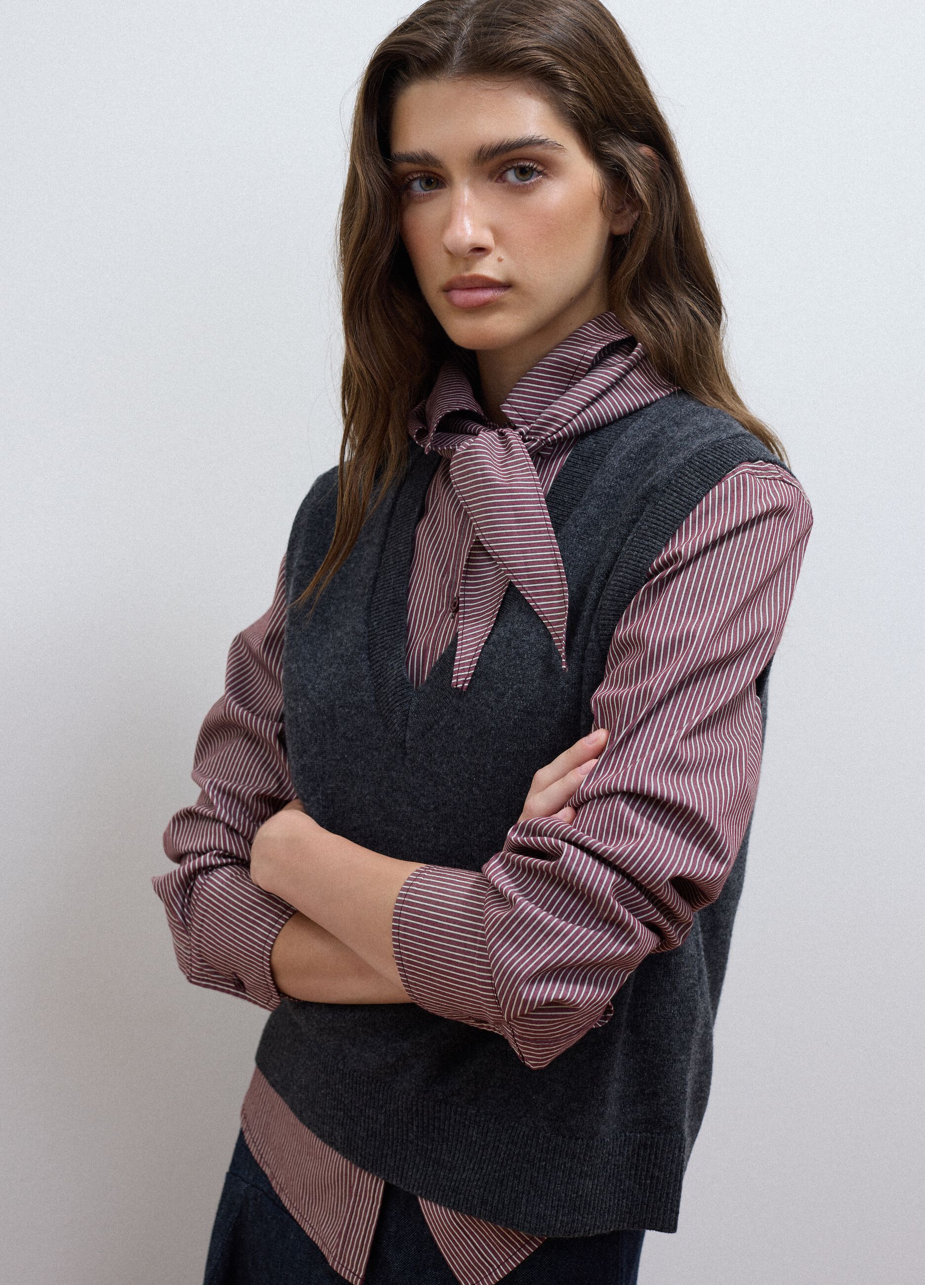 Grey pure wool gilet with deep V-neck