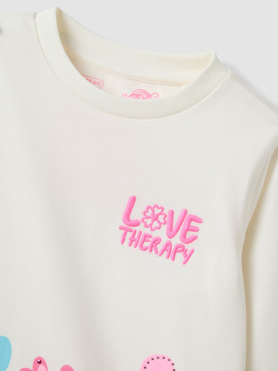 T-shirt bianca in cotone elasticizzato con fiori per bambina_2