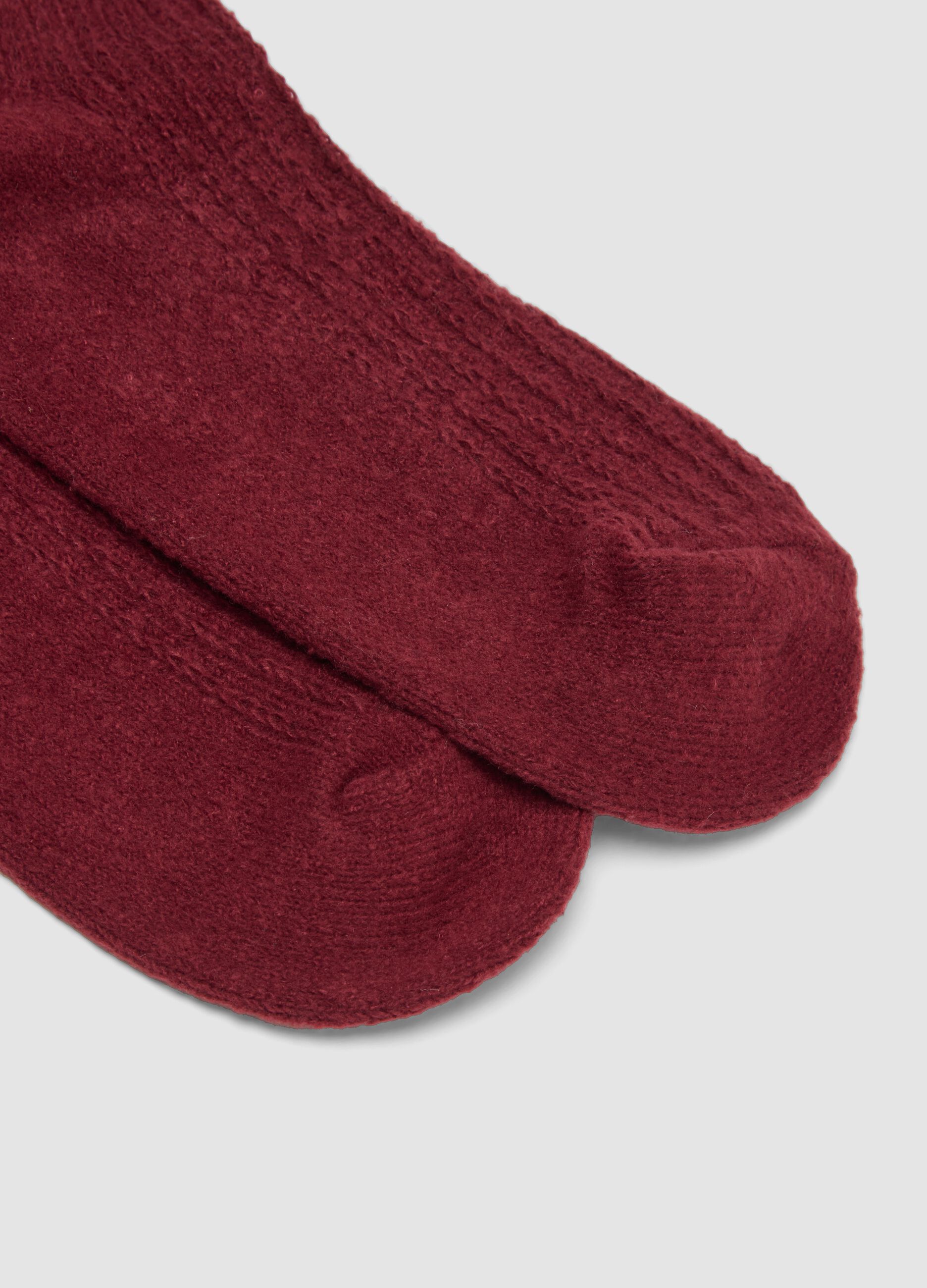 Burgundy red knee-high socks in stretch fabric