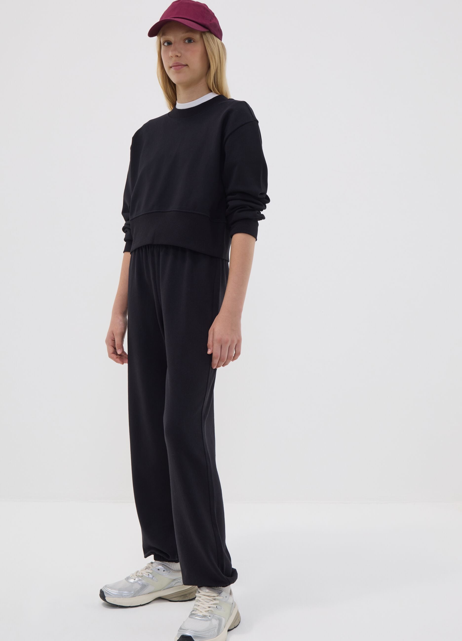 Black jogger trousers in organic cotton and viscose blend for girls