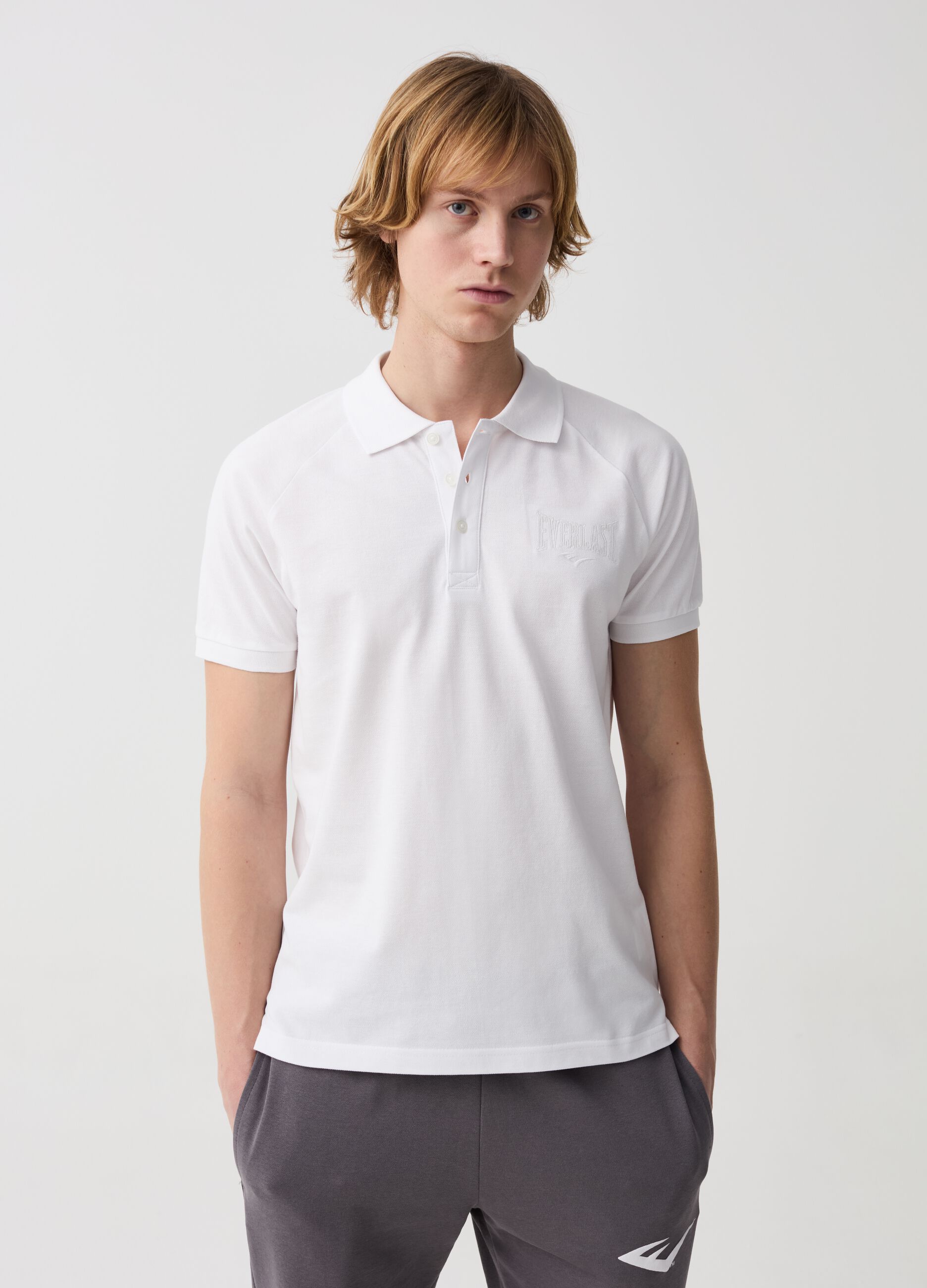 Polo shirt with raglan sleeves and logo embroidery