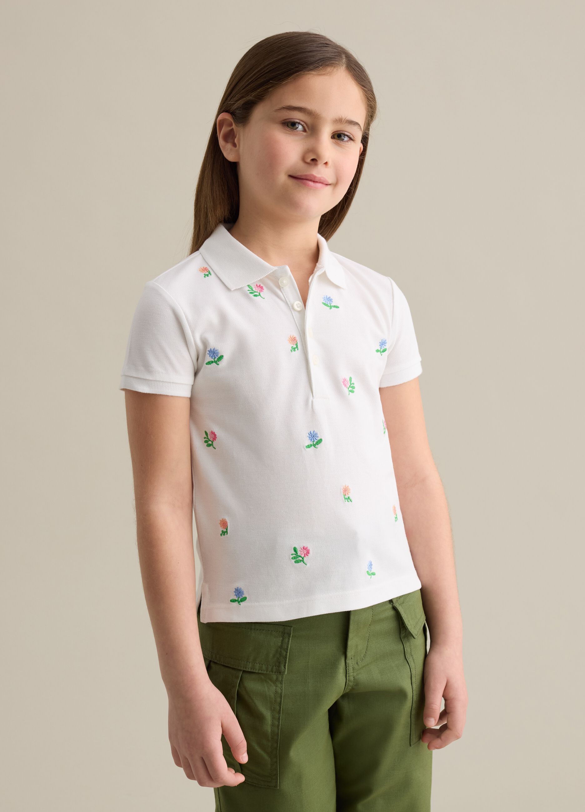 Cotton polo shirt with embroidered flowers