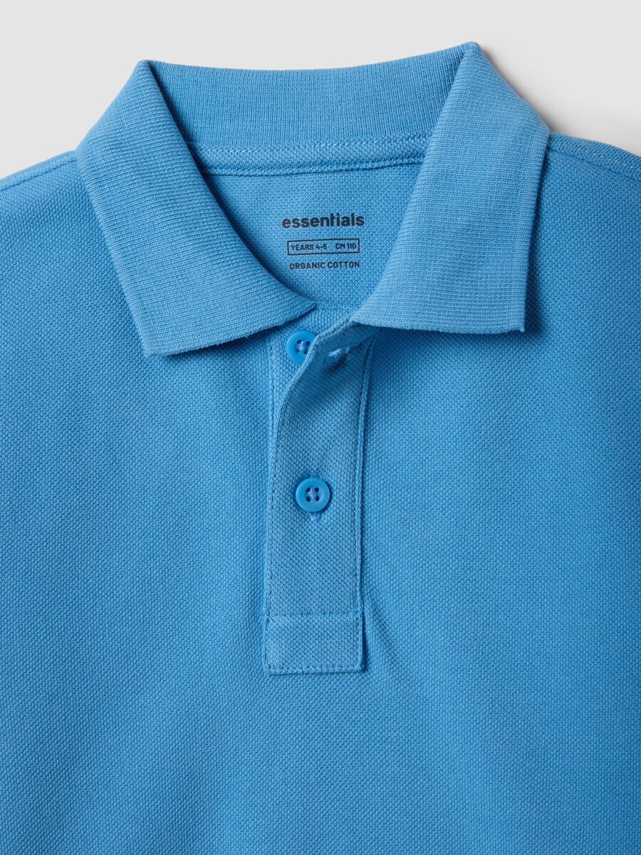 Polo a maniche corte azzurra in puro cotone organico da bambino_2