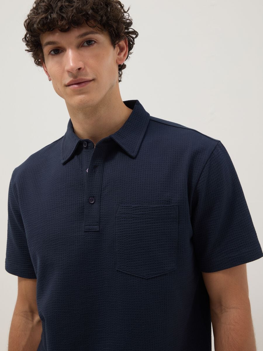 Blue short-sleeved stretch polo shirt_0