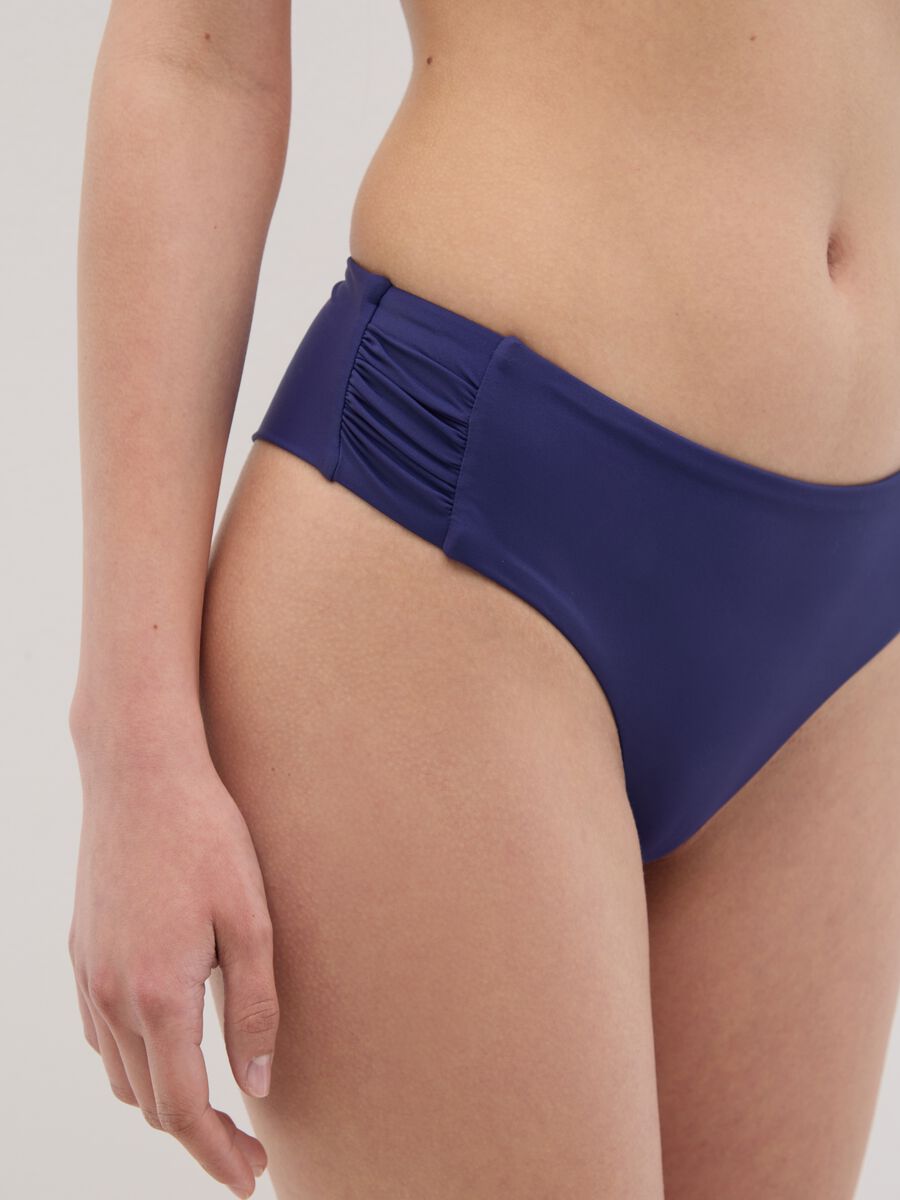 Women’s high rise bikini briefs in blue stretch fabric._4