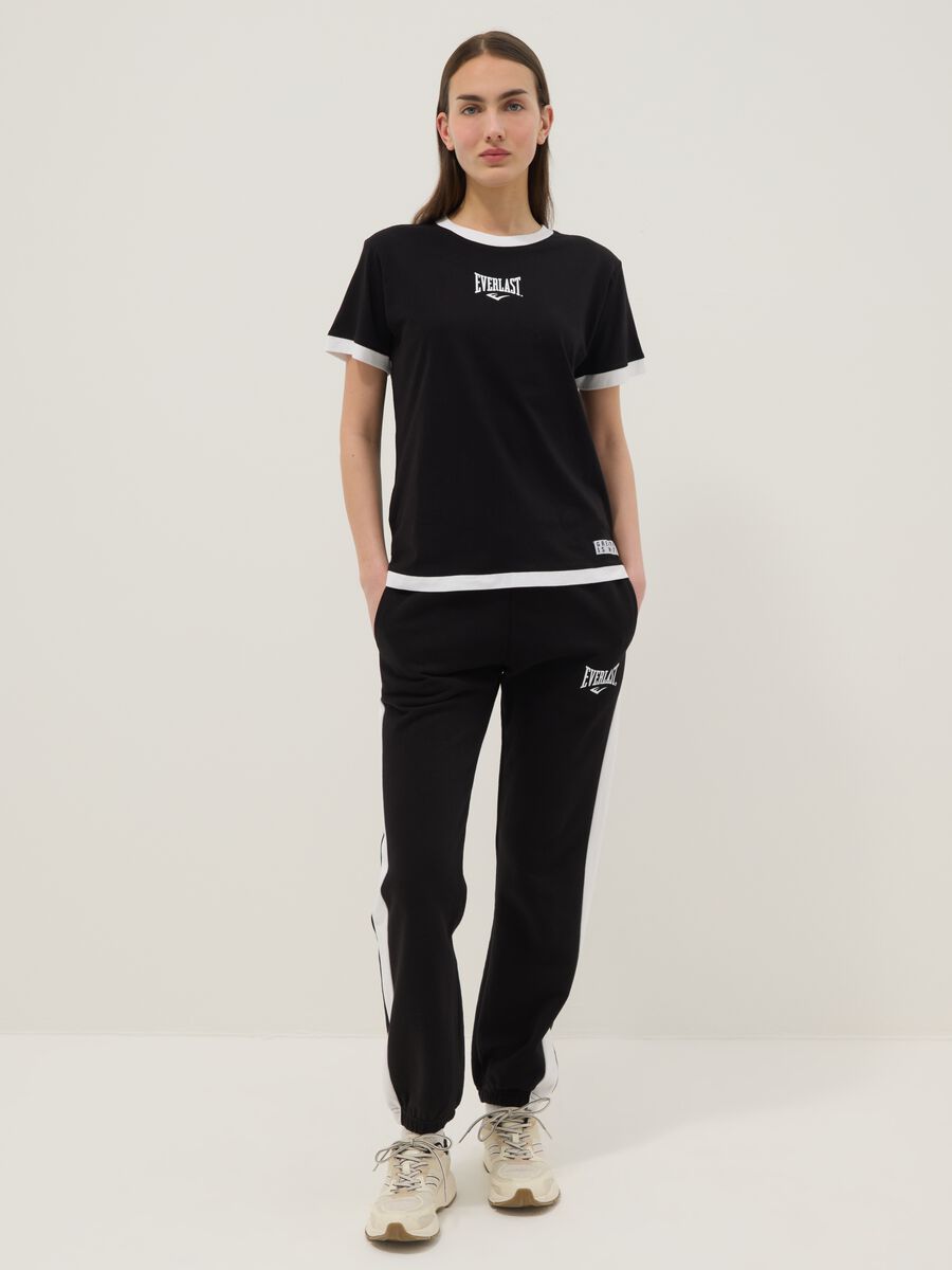 T-shirt in puro cotone nera regular fit con finiture bianche_1