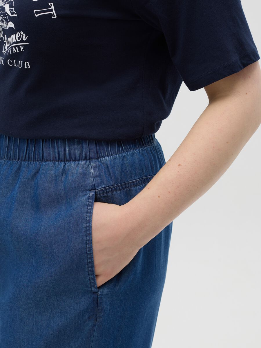 Curvy blue jogger trousers with denim effect_3