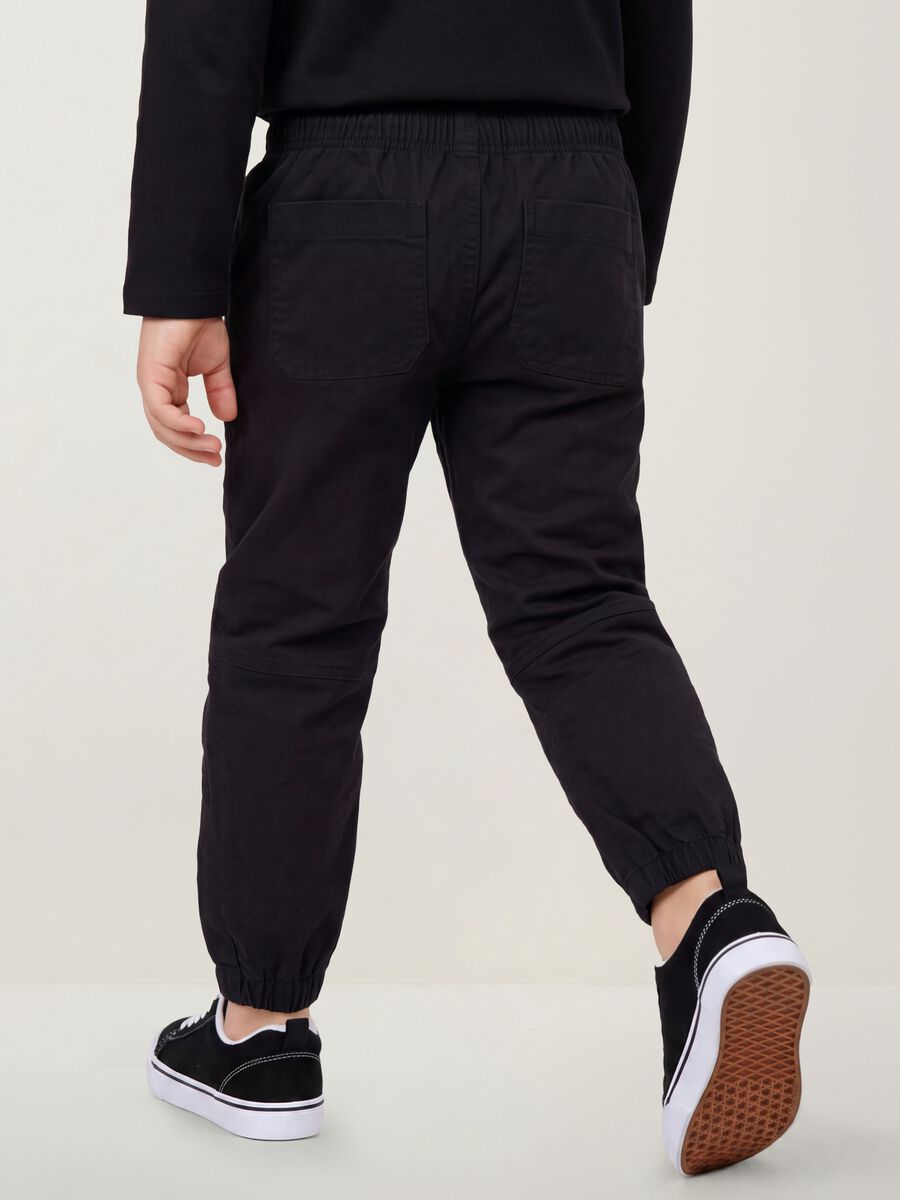 Black stretch cotton jogger trousers for boys_2